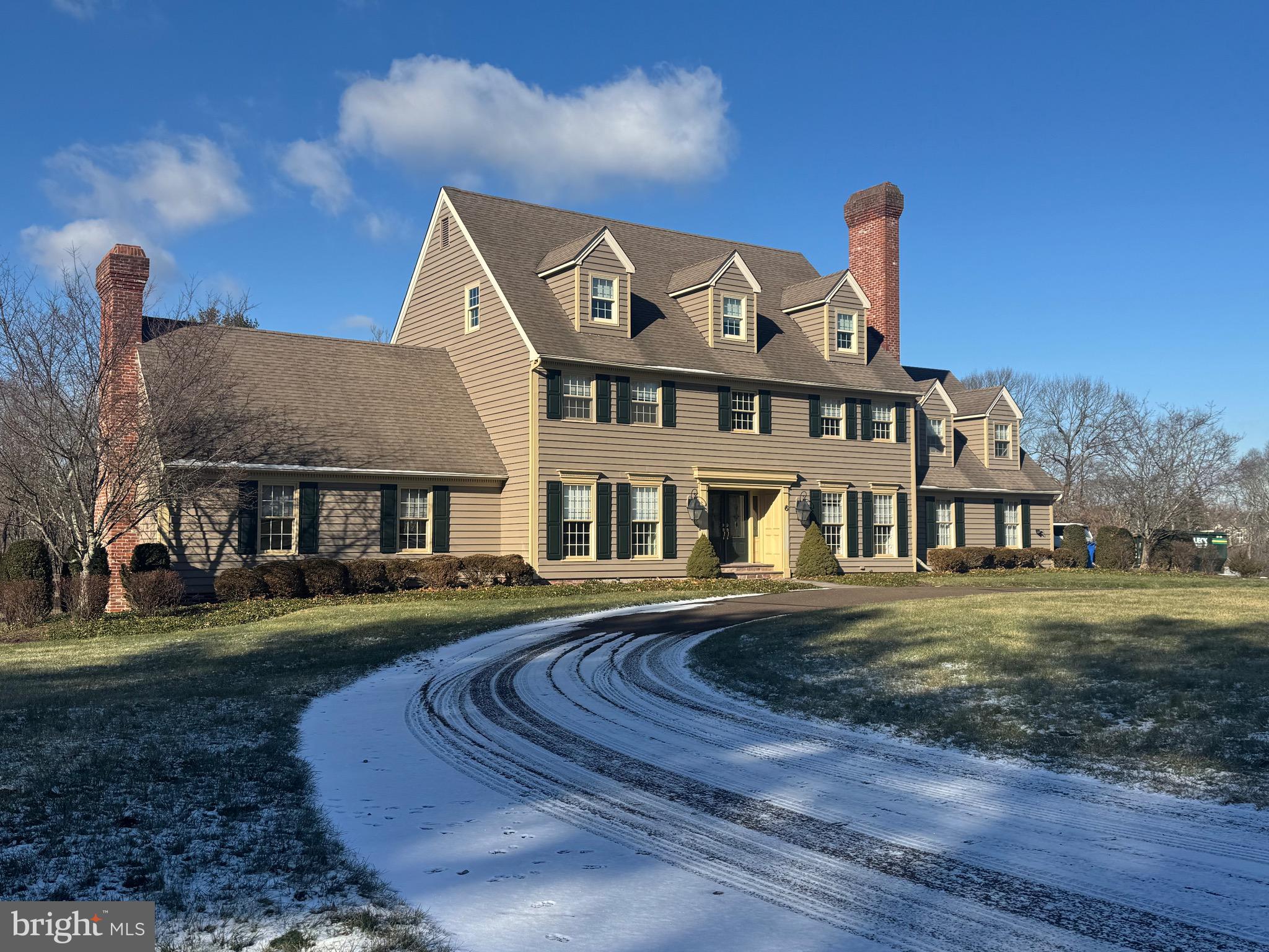 The residence of one of Bucks County' s old world craftsman, David J Schrenk is offered for the first time on the market.  Set on a private cul de sac, this Bucks County Traditional home sits majestically on a 5+ acre lot but yet is connected to a neighborhood.  The floor plan consists of a large Gathering Room with floor to ceiling stone fireplace, Breakfast Room with 3 sides of windows, Formal Dining Room, Private Study with fireplace,  Large Primary suite with Sitting Room, walk in closets, elevator and bath, 2 additional bedrooms and hall bath on second floor, Third floor has 2 more additional bedrooms and full bath on third level. Finished Lower Level with outside staircase, in-ground pool & spa, detached 3 car garage with pool changing room and bath. Sol Feinstone Elementary. Minutes from Newtown, Princeton and the I - 295 corridor.