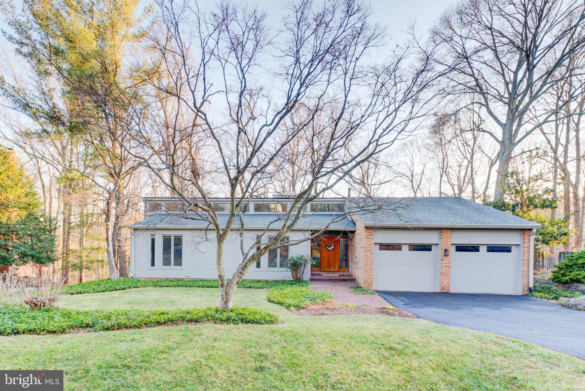 THIS WON'T LAST! A RARE opportunity in the highly sought-after Potomac community, stunning contemporary with tons of natural light, which feeds into the coveted Churchill high school pyramid (Bells Mill Elementary, Cabin John Middle School, and Churchill High School). This immaculately maintained and updated home has it's own private outdoor oasis to enjoy and entertain. These spaces include a large and expansive new deck, patio area, and beautiful garden! A bright and cheery, optimal floor plan features five bedrooms and three full baths. The main level boasts a beautiful foyer, vaulted ceilings with an exceptional family room & formal dining spaces, updated kitchen, working stone fireplace, and access to your large two car garage. Beautiful private breathtaking views of the backyard. The main level has an expansive primary bedroom with a walk in closet, private balcony area, tons of storage, laundry area, and an updated master bathroom with stunning travertine tile. The lower level is a walk out with lots of natural light, it also includes a nanny/in-law suite w, laundry, gym area, full bathroom, plenty of storage areas! Close access to major roads, highways, airports. Minutes to the heart of Bethesda, DC, national parks and so much more!