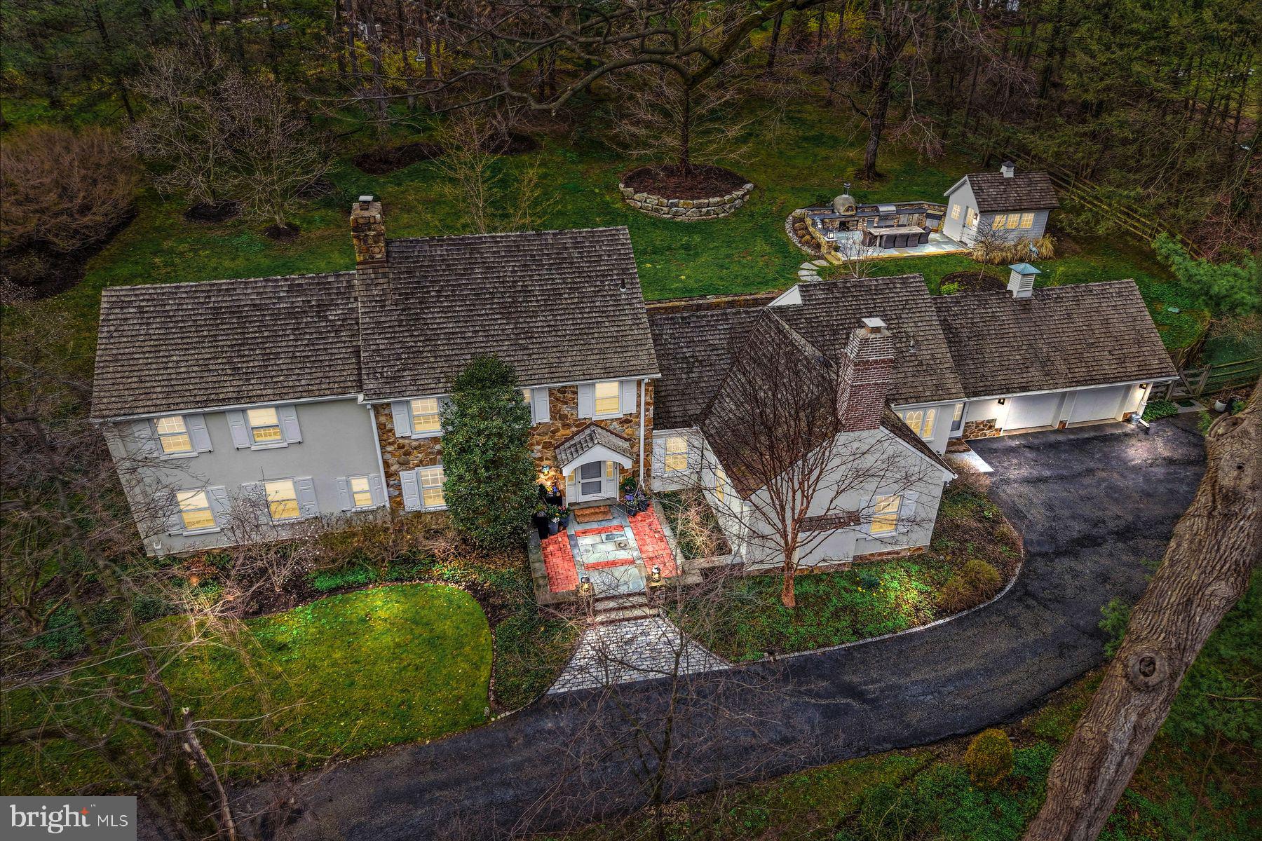 Look no further. This stunning sun-filled Gladwyne property, in a prestigious walkable neighborhood, has been beautifully renovated and improved both inside and out using timeless designs, stunning materials, beautiful craftsmanship and masterful architectural details. Original millwork, wide plank floors, fabulous moldings and bright Marvin windows are perfectly blended with tastefully expanded spaces including a gracious living room with large bright windows and fireplace, adjacent dining room with private views of the glorious grounds, stone walls and colorful plantings, spacious study with custom built-ins and elegant fireplace, a  bright state-of-the-art white gourmet kitchen with chef's appliances and sunny breakfast room leading out to the rear terraces and loft family room, luxurious marble baths, first and second floor primary suites and two additional generously proportioned bedrooms with full bathroom. Countless features include a recently terraced backyard destination with an incredible outdoor kitchen including a built-in grill station, pizza oven, refrigeration and charming cottage for storage, classic cedar shake roof, newer gutters, high efficiency systems, breathtaking landscaping with serene views and more. Move right in and instantly enjoy the comfortable living and gracious entertaining spaces offered by this incredible residence, all in close proximity to renowned Lower Merion and private schools, fabulous restaurants, shopping, the charming town of Gladwyne, all forms of transportation and Center City Philadelphia.