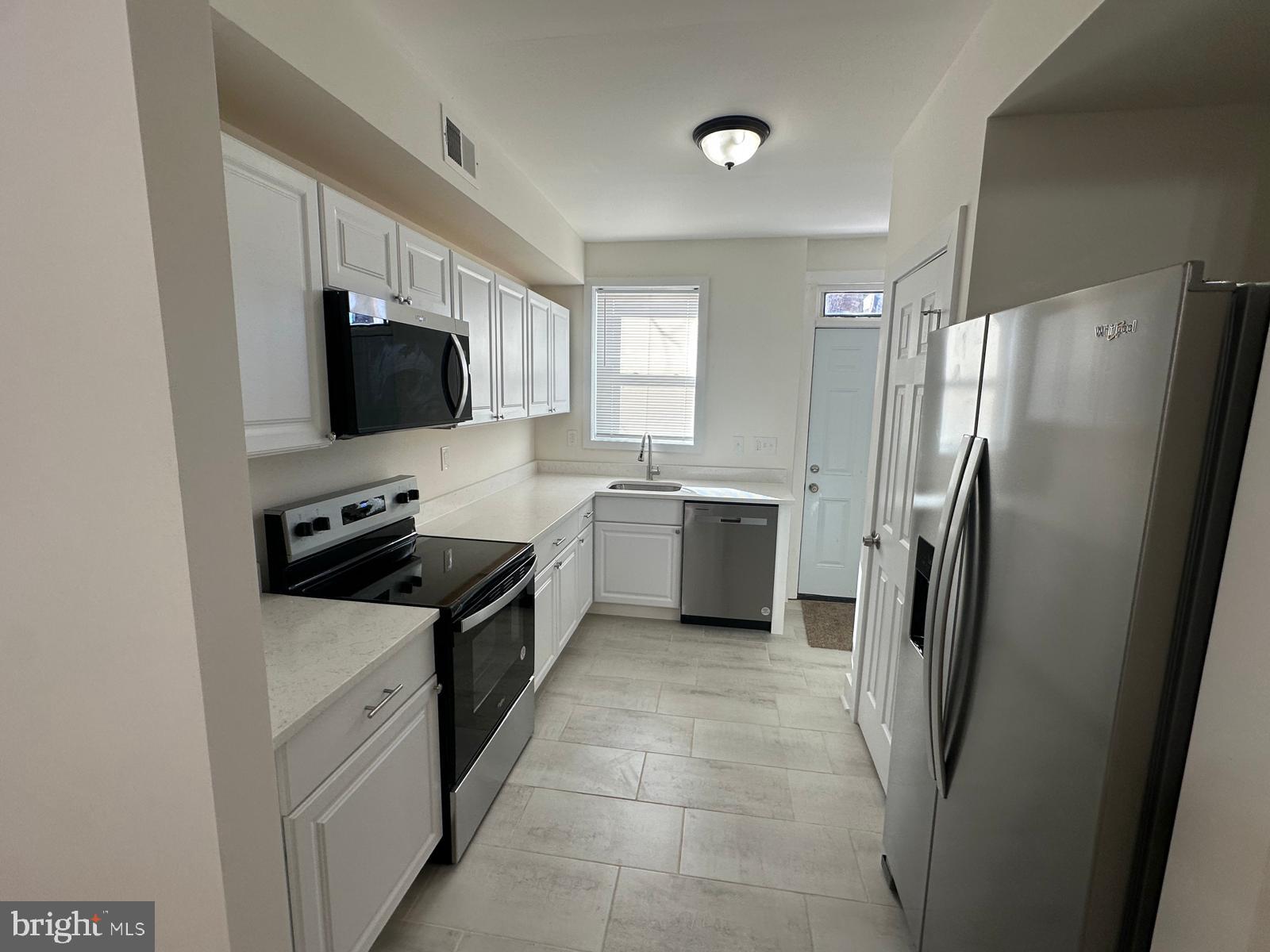 PRICE IMPROVEMENT JUST MADE!! WELCOME to 1220 N POTOMAC ST where character, comfort and convenience all come together nicely.  This updated three level rowhouse features modern touches throughout at a very competitive price.  Home features beautiful upgrades including new laminate wood flooring, SS appliances, quartz countertops, gourmet kitchen with pantry & new white cabinets, separate & versatile dining & living rooms, ceramic wall & floor tiles, upgraded bathroom, electrical heavy-up, freshly painted walls throughout, new HVAC & HWH, new carpeting on 2nd floor and covered front porch for people watching and winding down.   Top level of the home includes 2 spacious bedrooms with one pass thru bedroom for a total of 3.  Basement can be used for entertaining and storage with interior and exterior access with a washer & dryer hookup. The entire neighborhood is booming with development and revitalization and the prices of houses are skyrocketing so you will have instant equity at the favorable asking price!  Conveniently located to just about everything and it is cheaper than renting.  Great opportunity for the first time homebuyer or investor looking to add to their rental portfolio for positive cash flow.   All you have to do is bring your furniture and electronics with you and move in.  Please call the helpful LA with any questions and to schedule an appt.