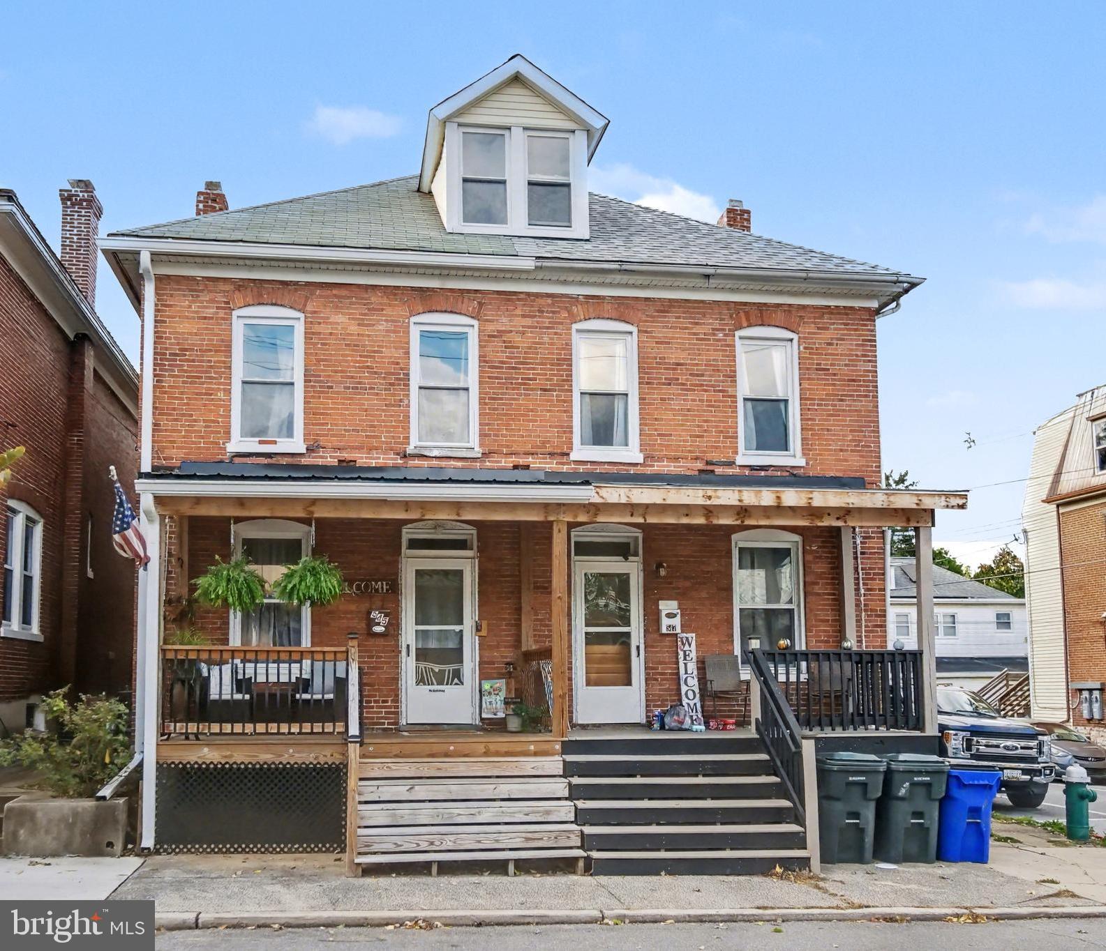 Welcome to 545 N Mulberry St, a charming brick colonial-style home in Hagerstown offering timeless character with thoughtful updates throughout. This 3-bedroom, 1-bath home features 1,332 square feet of living space with a spacious layout, updated flooring on the main level, and a beautifully renovated kitchen completed in 2017. The full bathroom was updated in 2015, adding modern comfort while maintaining the home’s classic appeal.

Enjoy a cozy living area with abundant natural light throughout. Recent improvements include newly updated front porch and rear deck flooring completed in 2023—perfect for relaxing outdoors or entertaining guests.

The home offers forced air gas heat and central air conditioning, plus an unfinished basement AND a walk-up floored attic ideal for storage. Appliances including refrigerator, range/oven, dishwasher, microwave, washer, dryer, and freezer all convey. Situated on a lovely lot with and park views nearby, this property combines convenience, charm, and value.

An added bonus for eligible buyers—this property may qualify for up to $7,500 through the Hagerstown Homeownership Initiative grant, along with additional buyer assistance programs available through the Maryland Mortgage Program. These opportunities may help reduce upfront costs for qualified purchasers.

Whether you're a first-time buyer, looking to downsize, or seeking an investment opportunity, this move-in ready home is one you won’t want to miss.

Buyer assistance programs subject to eligibility and approval. Not all applicants will qualify.