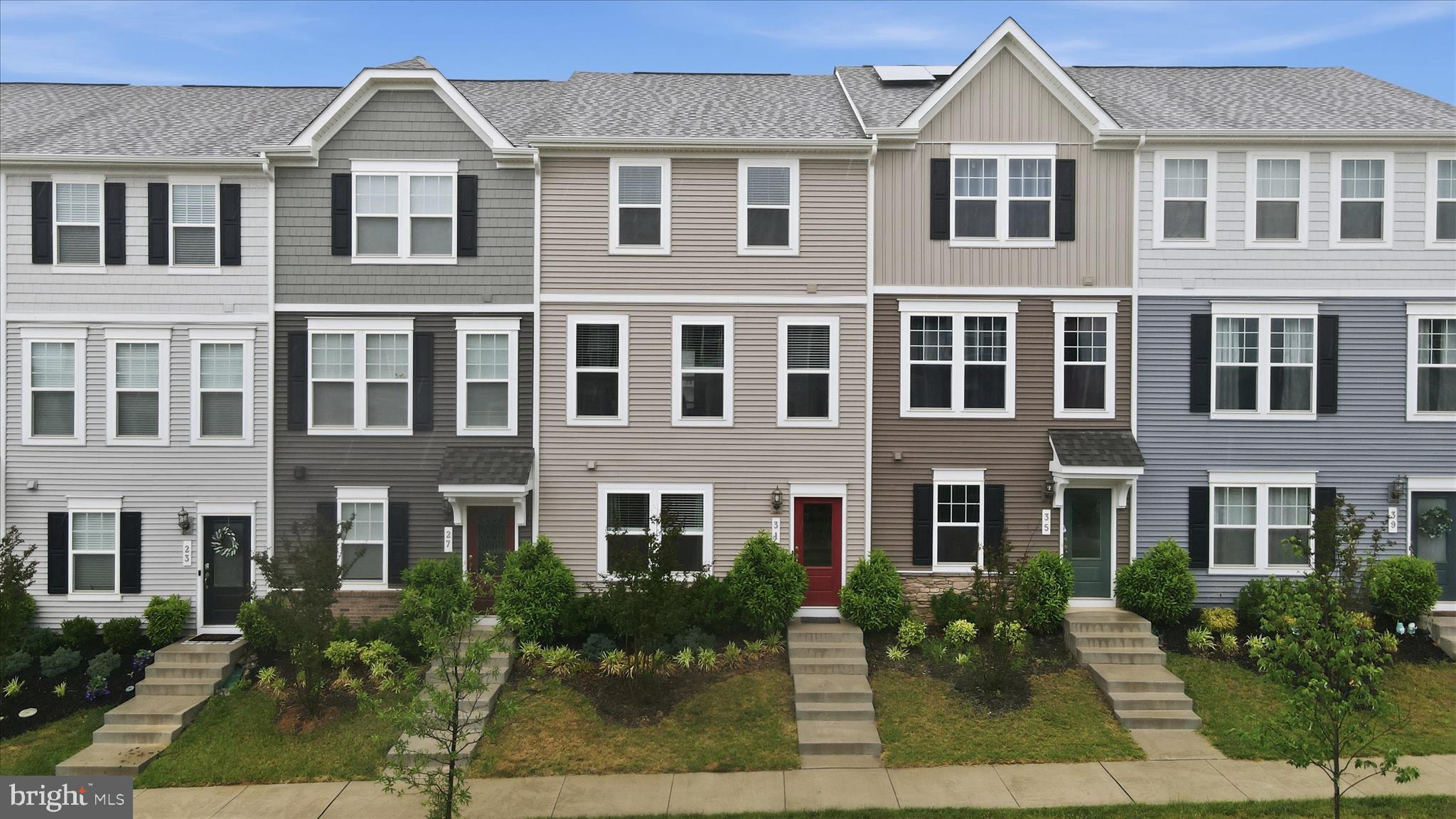 Great Opportunity to own practically a brand new townhome for less money!! This townhouse is centrally located where the small court yard is, it has a large 2 car garage with the double driveway to park 4 cars. This is one of the larger townhouses in the neighbor hood (1641 sq ft) and is ready to move in!  This was a second home for the sellers. This one is a must see at this price! Check out the virtual tour here too!