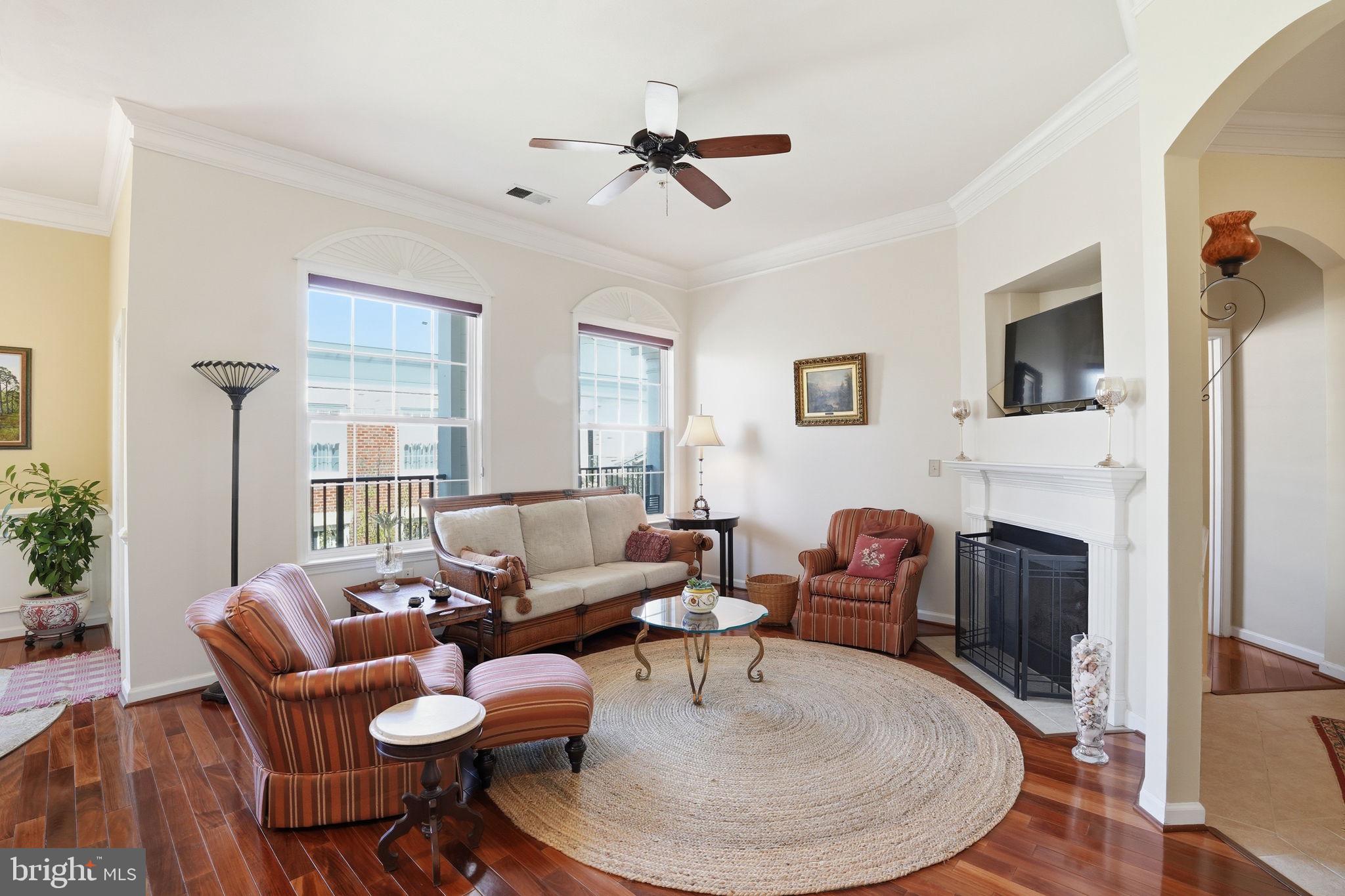 Welcome to 31 Booth St #450 in The Colonnades at the Kentlands — a light-filled, top-floor corner unit offering space, comfort, and an exceptional lifestyle in one of Montgomery County’s most sought-after communities.

This well-maintained 3BR/2BA condo features an open layout with hardwood floors, abundant natural light, and  fireplace. The kitchen includes granite countertops, stainless steel appliances, and a walk-in pantry, seamlessly connecting to the living and dining areas and out to a huge private balcony — perfect for relaxing, entertaining, or enjoying peaceful views.

The primary suite offers balcony access, a large walk-in closet, and an en-suite bath with dual vanities. Two additional bedrooms, another full bath, and in-unit laundry provide flexibility and convenience. Additional highlights include garage parking on the same level and extra storage in a dedicated storage room just outside the unit — both rare and highly desirable features.

Residents of The Colonnades enjoy resort-style amenities, including a pool, fitness center, library, and party room.

The Kentlands lifestyle truly sets this home apart — with easy access to parks, walking trails, scenic ponds, and open green spaces, all designed around a walkable, community-focused setting. You’re also just minutes from Great Seneca Highway, major commuter routes, and nearby biotech and life sciences hubs, making this an ideal location for both convenience and long-term value. Enjoy shopping, dining, and local favorites like Quincy’s Golf & Social right in the Kentlands.

A rare opportunity to own a top-floor corner unit that combines space, light, and an unbeatable location.

Open house this Saturday 4/25/2026 from 2-4pm!