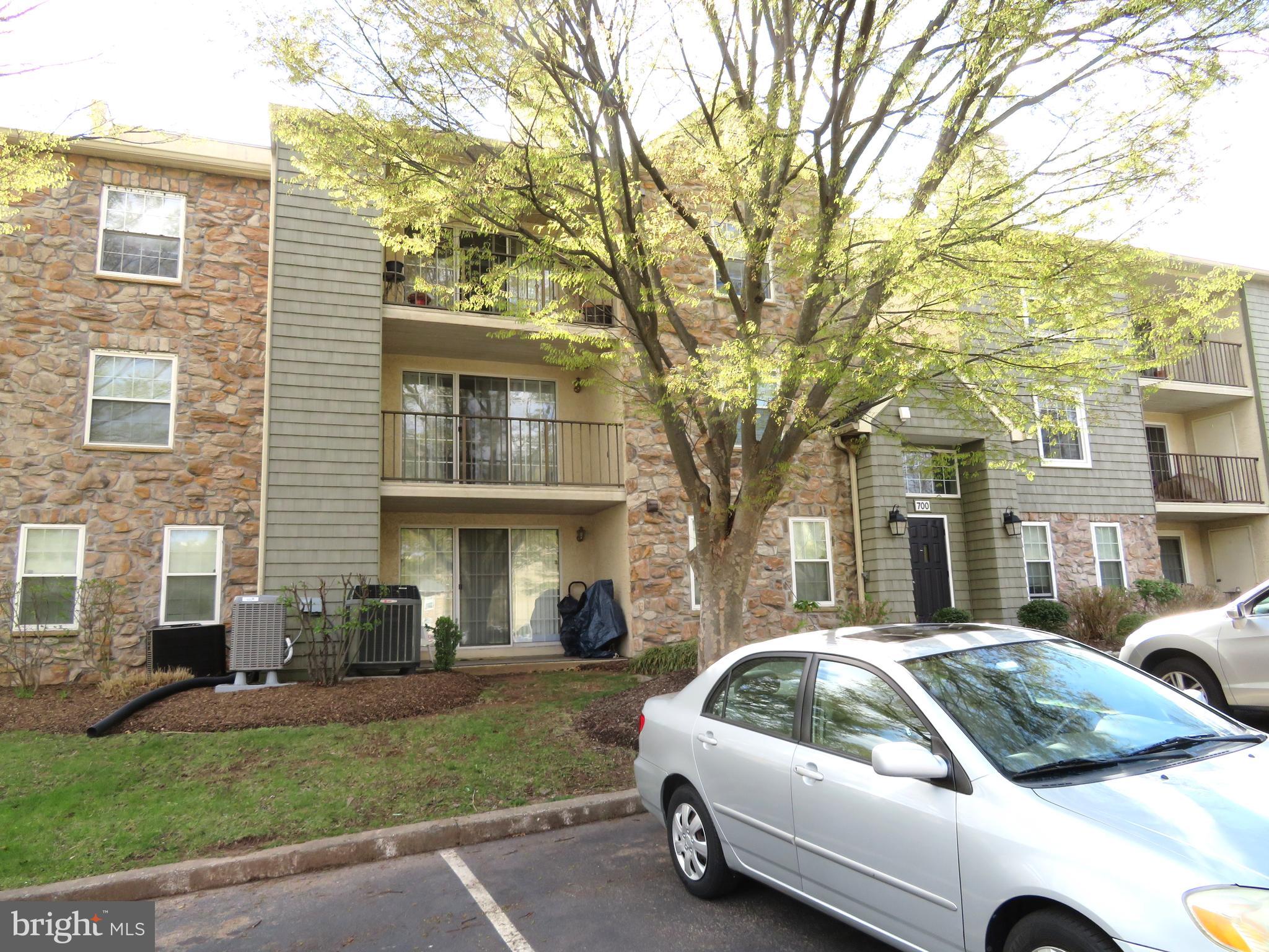 Welcome to this Great Opportunity to make this second-floor condo located in the sought-after Deer Run community your own! This spacious 2-bedroom, 2-bath unit in need of TLC,  offers a welcoming ceramic tile foyer with a large double closet, perfect for extra storage. The expansive living room features a cozy brick wood-burning fireplace with a classic wood mantle, creating a warm and inviting atmosphere. Sliding glass doors lead out to a large private balcony, complete with a utility/storage closet for your convenience.  The open-concept kitchen boasts abundant wood cabinetry, stainless steel appliances, and a deep stainless sink—ideal for all your cooking needs. Adjacent to the kitchen is a bright breakfast area, perfect for casual dining or morning coffee.  The spacious primary bedroom includes a walk-in closet and a full en-suite bathroom with ceramic tile flooring and a tub/shower combo. The second bedroom is situated on the opposite side of the unit, offering privacy, and includes a large closet. A second full bathroom is located off the hall and also features ceramic tile flooring and a tub/shower combo.  Additional highlights include central air conditioning, 6-panel doors throughout, and a generously sized laundry room.  Other features include central air and 6-panel doors throughout, a playground area, as well as the option for Pool membership through Stony Creek if you choose to join.  This unit is located with easy access to many shops, restaurants, and major arteries for all our travel needs.