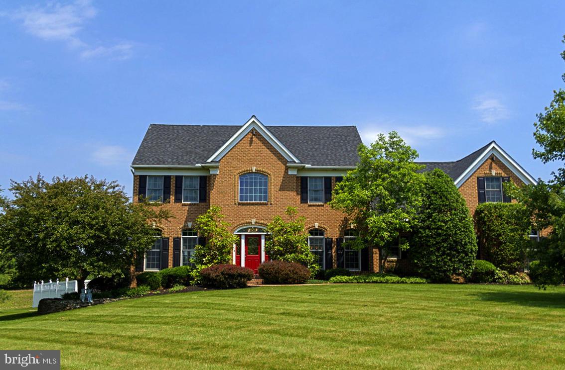 Hempfield Schools with 20+ acres with all brick Colonial style home & superb views.  4+ spacious Bedrooms (incl a huge Master Suite) plus 4-full & 1-half Baths/Full finished lower level guest suite with 2nd kitchen/Scenic approach with pristine landscape/Large gated inground pool & patio/Bright Cook's Kitchen loaded/Generous Family Room with cozy FP/Hardwood & Tile floors/ Pretty screened porch/Large Barn/Plenty of parking/Clean & Green. Amazing!