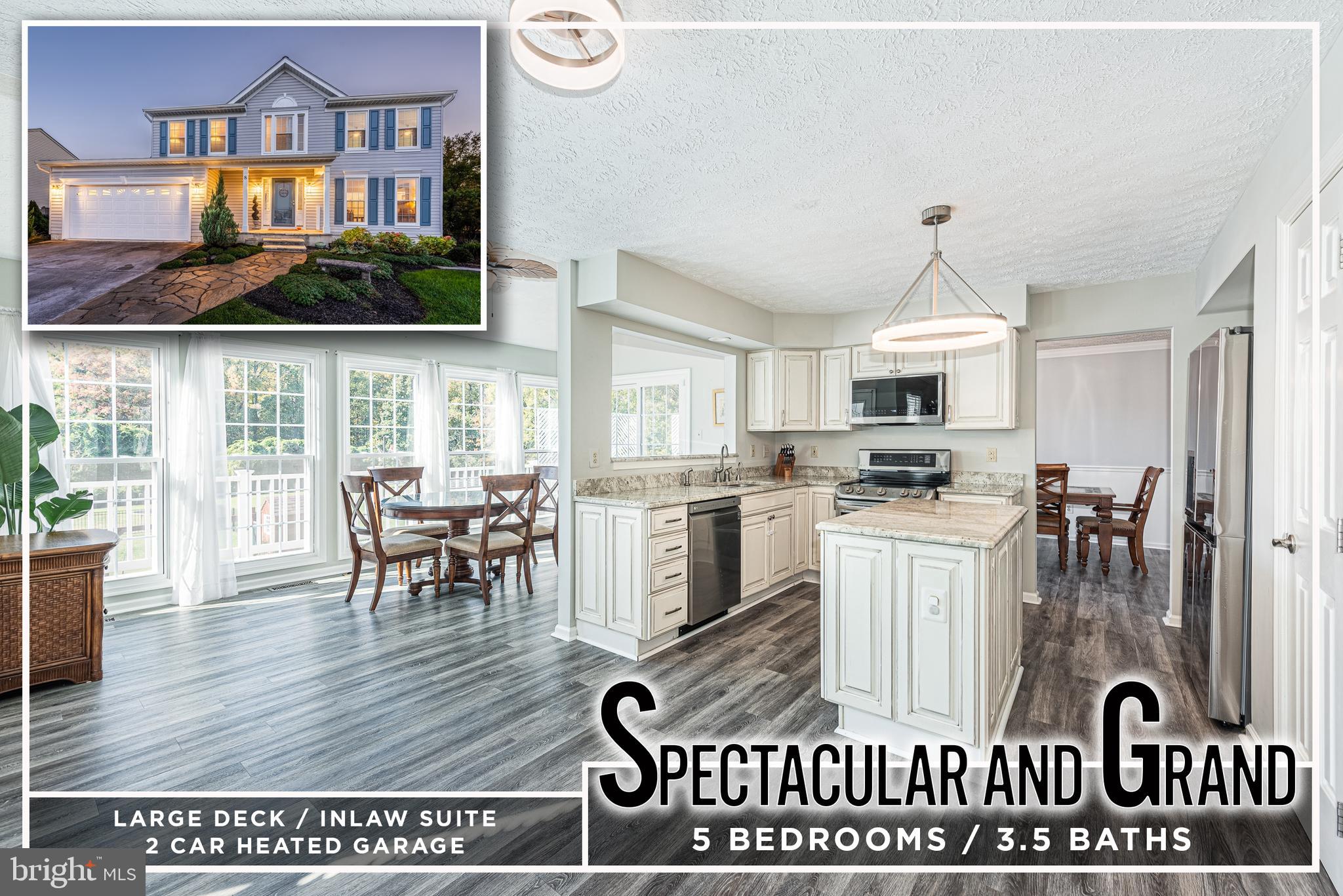 SPECTACULAR & GRAND UPDATED COLONIAL WITH A WIDE ARRAY OF AMENITIES! Over 3,500 sq. ft. of meticulously maintained living space featuring vinyl plank flooring throughout the main level, a formal living room and separate dining room with crown molding, a gourmet island kitchen with granite counters & ss appliances, a generously sized family room with tons of natural light, and a main level sunroom/breakfast area.  The upper level offers a total of 4 bedrooms & 2 full baths including an oversized Primary bedroom suite with a walk-in closet and a spa bath with double sinks, separate shower, and a large soaking tub.  The walk out finished basement would be perfect for an in-law suite and features a living space with a gas fireplace, a kitchenette area, a spacious bedroom and a full bath.  There is plenty of exterior living space with an expansive rear deck that overlooks the spacious rear yard.  Parking is not a problem with a 2 car heated garage with additional storage space and 2 car driveway.  Location can't be beat - convenient to tons of shopping & restaurants, and convenient to parks, schools, and major roadways.  This one truly has it all!