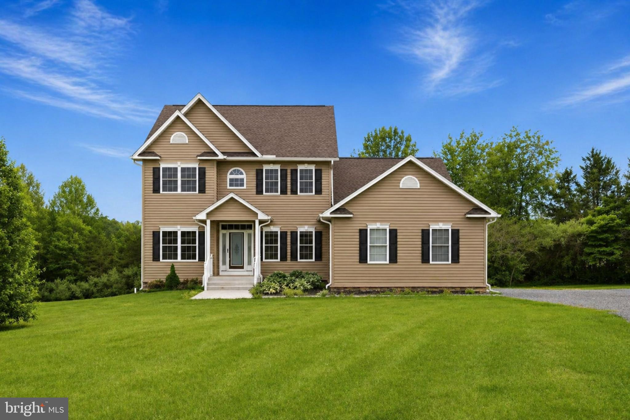 Step into your private Unionville retreat, where acreage meets intention and lifestyle takes center stage. Perfectly positioned on 4.45 serene acres, this home makes an immediate statement with a grand two-story foyer and abundant natural light flowing effortlessly throughout the main level. The true focal point is a dramatic two-story family room highlighted by a stunning floor-to-ceiling gas stone fireplace, creating a warm and inviting space for gatherings.

The kitchen opens seamlessly to the family room and is designed for both everyday living and entertaining, featuring an oversized island, granite countertops, stainless steel appliances, and a functional layout that keeps everything within reach. The main-level primary suite delivers comfort and convenience, complete with an electric fireplace for cozy evenings and a private bath offering double vanities, a stand-up shower, and a relaxing Jacuzzi tub.

A dedicated office, formal dining room, and main-level laundry add smart functionality where it matters most. Upstairs, three generously sized bedrooms provide flexibility for guests, hobbies, or changing needs.

Outside, the lifestyle continues with a spacious rear deck, above-ground pool, storage shed, and a heated two-car garage, because comfort should extend beyond the front door. Major upgrades include a whole-house generator, high-speed fiber-optic internet, and a conditioned crawl space for efficiency and peace of mind.

Located just minutes from Lake Anna and within easy reach of Locust Grove, Culpeper, Fredericksburg, and Richmond, this home offers the privacy of country living without sacrificing convenience. Acreage, infrastructure, and thoughtful design like this do not come around often. If you have been waiting for space without compromise, this is your move.
