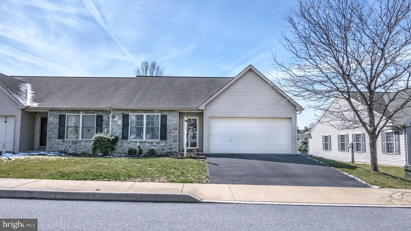 You'll love this open layout on one floor with vaulted ceiling, large kitchen island and beautiful maintenance-free vinyl wood-plank floors.  No HOA and home backs up to a park. Situated on a quiet residential street yet easy access to Rte 222.