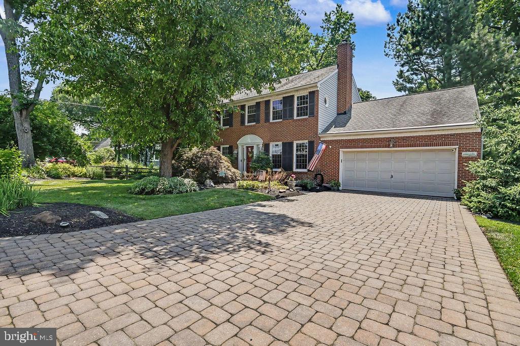 Welcome to this North Wilmington beauty.  The home is located at 216 Old Mill Lane in the popular development of Liftwood.  This home has been very well cared for over the years.  It is roughly 3800 square feet with the added Florida room (20x25) off the kitchen, with cathedral ceiling and heater.  The home features 4 large bedrooms, 2.5 baths.  The kitchen has 42-inch cabinets, newer appliances, granite counters and an island with bar stools. The yard is incredibly maintained by the owners as a hobby.   The double driveway is made with pavers, and the gutter guards are another added feature to this wonderful home.  The HVAC system is newer (still under warranty), electric updated and new box installed.  The attic is floored for extra storage, all bathrooms have been updated, crown molding throughout most of the home.  The backyard offers a trek stairway leading to a two-tiered paver patio.