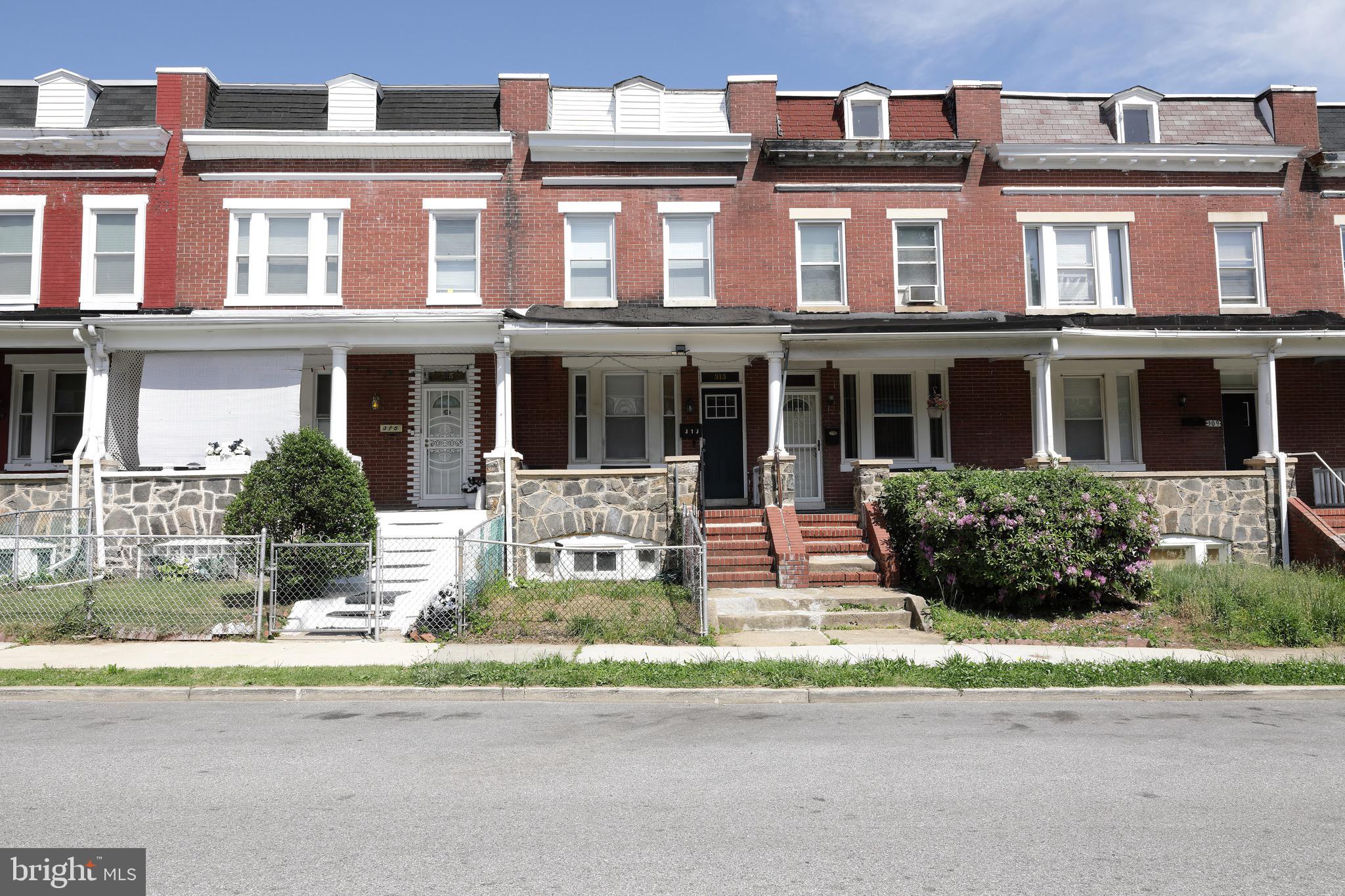 Motivated Seller -  Central A/C - This fully updated 3-bedroom, 1.5-bath townhome sits in a Baltimore City corridor undergoing exciting revitalization, just moments from the Edmondson Village Shopping Center redevelopment  Inside, you’ll love the gourmet kitchen with white cabinetry, quartz-style counters, tile backsplash, stainless steel appliances, gas range,dishwasher, built-in microwave, and a breakfast bar that opens to the dining area. The main level also features a rare half bath, bright living and dining spaces, and stylish flooring throughout. Upstairs are three comfortable bedrooms and a beautifully updated full bath with modern fixtures. A full unfinished basement offers great storage and potential for an additional bath or finished living space. Enjoy a fenced rear yard plus easy street and rear parking.