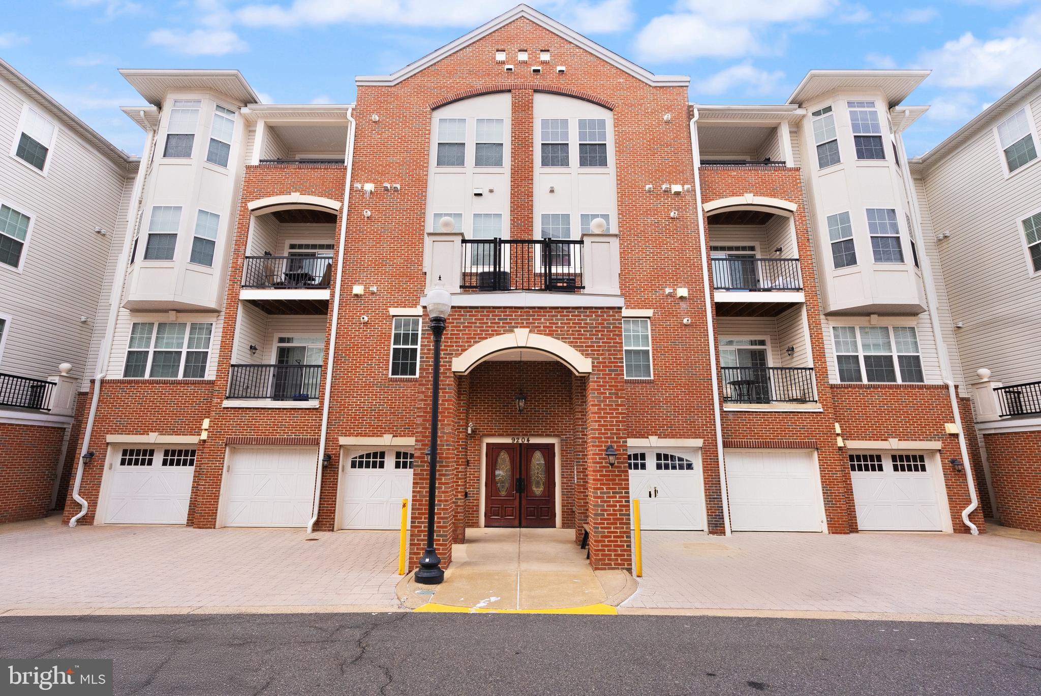 Back on the market due to no fault of the seller. Amazon Direct to unit door delivery! Unit is Ground Floor access and has many Mobility Assistance/Wheelchair friendly features! Walk-out Patio! Walk-in shower in Primary Bath, Smoke-Free Super Clean Condo in a modern 55+ community! This 2 bedroom 2 full bath luxury condo in The Gatherings at Wellington is move-in ready! You will feel the enjoyment of daily living in the easy to maneuver open floor plan with spacious living and bedroom areas. The kitchen has loads of cabinets and a pantry cabinet, too! Some cabinet fronts are removable for wheelchair pull-in. You'll love the warm, inviting tones of exquisite cream-gray-black expansive Granite countertops with tiled back splashes and an elevated matching granite breakfast bar counter on the backside of the stainless steel under-sink, abundant electrical outlets to plug in lots of gadgets. A 4-burner gas stove/oven, stainless steel appliances, laminate wood flooring and a new disposal from 2023 will have you spending quality time loving to cook! There is a separate 9 x 10 foot dining room with overhead light for you to enjoy those wonderful meals or it can be used as an office/reading room. Imagine basking comfortably on your giant furniture in the huge 23 x 13 foot living room with tray ceiling above, watching the western sunset shining through the walk-out patio door wall. The wide open primary bedroom suite gets tons of natural light in the afternoon! It includes a sitting area for a total of 23 x 13 feet, a walk-in closet, a second wall closet, its own attached bright and cheerful full bath with a low step, easy access stall shower, updated tile walls, floor and sitting ledge, safety bars, and a double sink. The large second bedroom at 14 x 12 feet will comfortably fit a king size bed! It also gets loads of sunlight from noon onwards. Or you can use it for your workshop/hobby room. Only a step away is a large walk in closet and full bath with safety bar equipped tiled wall shower tub and tile floor. The hall bath cabinet has a removable front to accommodate a wheelchair. Washer and Dryer are neatly tucked away in an easy access closet. This unit comes with a private 1 car over sized 13 x 18 garage with private interior hallway service door, Handicap Accessible Parking in front of the garage door plus 1 reserved parking space (#3) for a total of 3 parking spaces with this unit in addition to the visitor parking! Condo association includes snow removal, water, sewer and trash! Building is equipped with handicap accessible elevators to visit neighbors on upper floors and a cozy lobby where you will find a sitting area and access to mailboxes. Great location minutes from shopping, restaurants and Old Town Manassas, the VRE, and several OmniBus stops only minutes walk down the street. Up-to-date condo docs and resale certificate available on request. Special Note: Some residents may qualify for the City of Manassas Real Estate for the Elderly or Disabled tax relief program. Contact the Commissioner of the Revenue, City of Manassas for further information to see if you qualify on this property for tax relief.