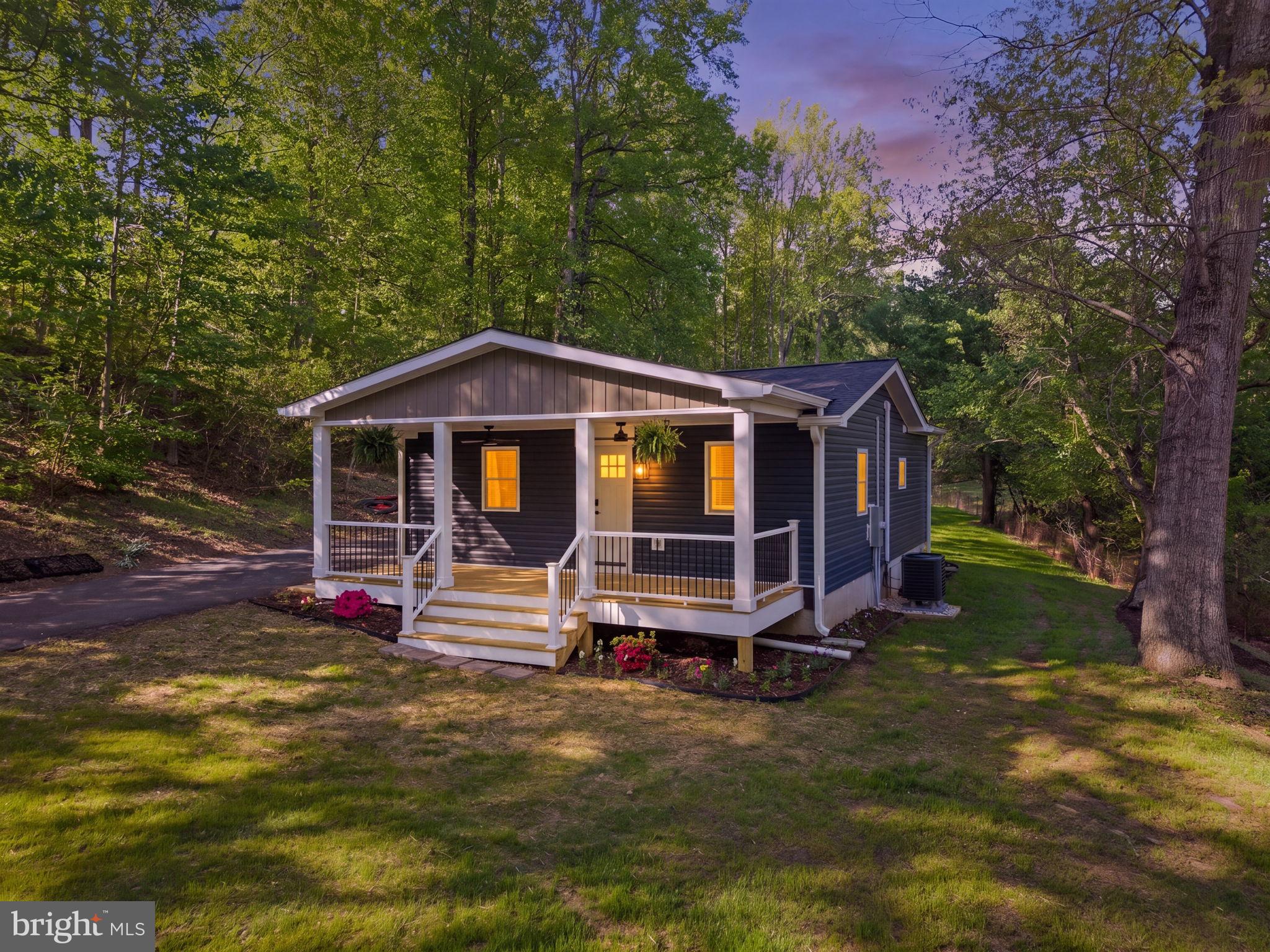 Enjoy your coffee with the sunrise on the back deck. Then take an afternoon break on the covered front porch to take in the peacefulness Madison county has to offer. Charming and cozy 2 bed 1.5 bath cottage in the foothills of Madison county. Conveniently located to Rt. 29. Everything in this house is brand new, Major rehab completed in 2026. All systems, alliances, electrical, plumbing, HVAC, encapsulated attic and crawlspace, spray foamed walls.  

Property is also listed for lease.