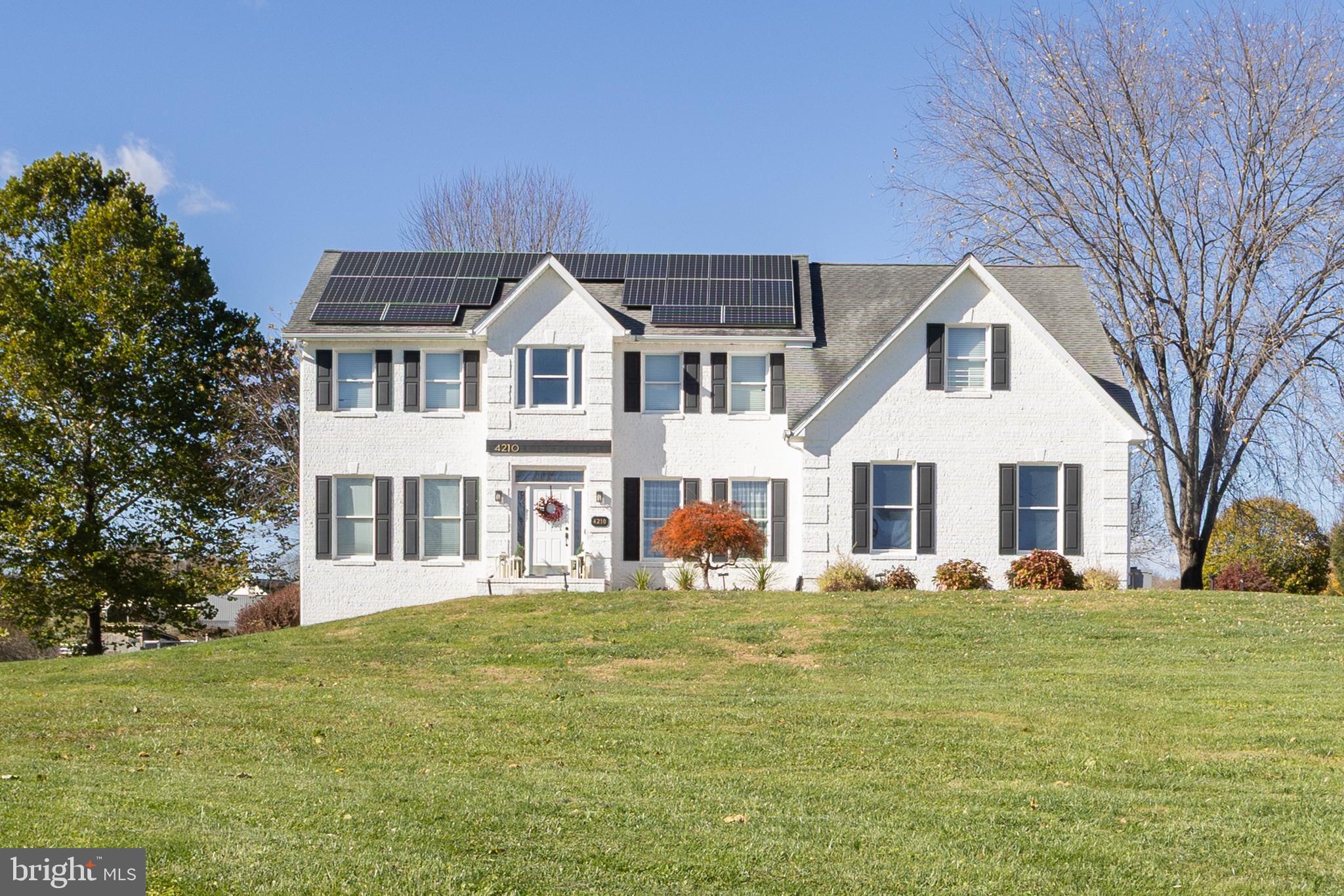 Seller is willing to offer a Seller Credit of $20,000 with a full price offer.

Experience peaceful country living in this beautifully updated 5-bedroom, 3.5-bath home situated on a level 2.97-acre lot. Offering over 3,000 square feet of living space, this property blends modern updates with timeless charm.

The main level features hardwood floors, cathedral ceilings, a spacious great room, formal dining room, private office, and a gourmet kitchen remodeled in 2023 with updated finishes and ample storage. The home also includes a convenient main-level bedroom and powder room.

Upstairs, the large primary suite offers a walk-in closet, sitting area, and a luxurious master bath with marble flooring and a soaking tub. Three additional bedrooms and a full bath provide plenty of space for family and guests. The lower level, completed in 2018, includes a finished basement with a recreation room, bar area, gym, and additional rooms for flexible use.

Recent updates include a 2023 exterior repaint, new carpet (2023), owned solar panels (2019), washer and dryer (2022), and water heater (2018).

Outdoor living is enhanced by a brick patio, play set, and expansive flat backyard—perfect for entertaining, gardening, or simply enjoying the quiet country setting.

This move-in ready property combines the best of modern convenience and country charm!