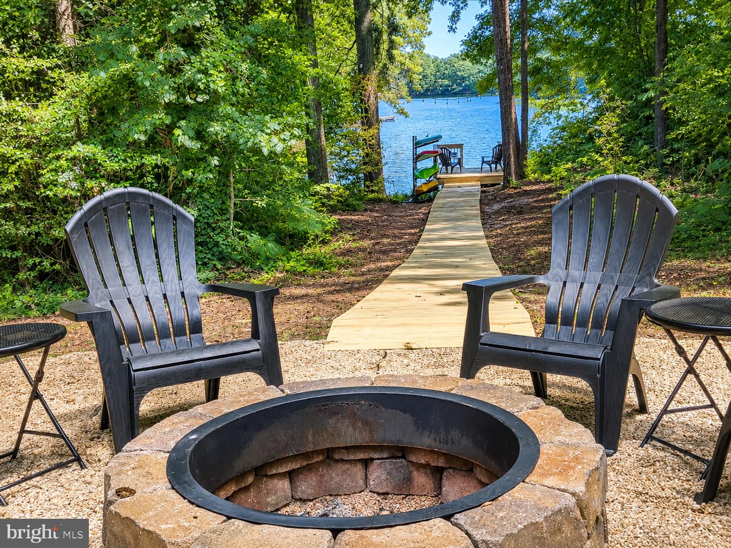 Looking for an amazing house offering 4 bedrooms, 3.5 bathrooms located on Drum Point Pond the premier lake in Drum Point.  This community is offers so much to include a beach on the Chesapeake Bay and this home is lake front with it's own private pier. You can kayak, paddle board, swim, fish and more from your own dock. This home was completely renovated in the past few years and has so much to offer to a new owner. The impeccable design is well though out and the finishes are inviting and warm.  The main level offers a great space welcoming all to the family room, kitchen and dining room have nice views to the water side with a sprawling deck off the back with views of the firepit and private yard. The upper level offers 3 good sized bedrooms and 2 full bathrooms with good space for the primary suite which you will love. The lower level is set up as an entertainers delight with a game room another bedroom and full bath. Step out back and enjoy the hot tub in your private backyard. This home has so much to offer.