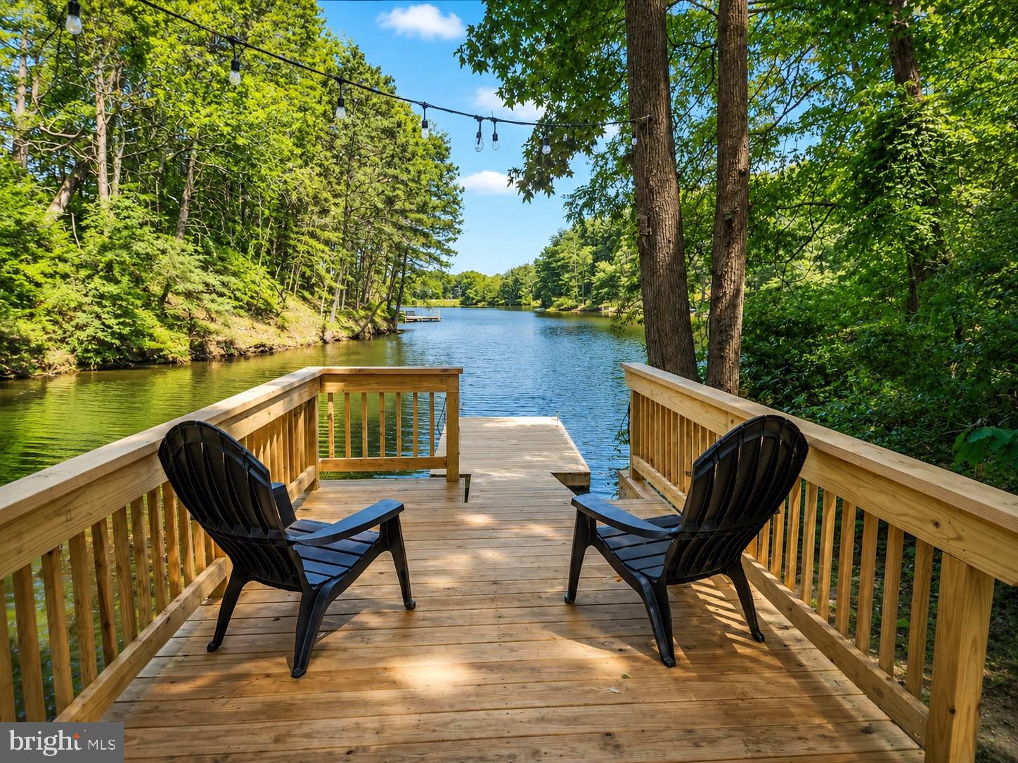 Looking for an amazing house offering 4 bedrooms, 3.5 bathrooms located on Drum Point Pond the premier lake in Drum Point.  This community is offers so much to include a beach on the Chesapeake Bay and this home is lake front with it's own private pier. You can kayak, paddle board, swim, fish and more from your own dock. This home was completely renovated in the past few years and has so much to offer to a new owner. The impeccable design is well though out and the finishes are inviting and warm.  The main level offers a great space welcoming all to the family room, kitchen and dining room have nice views to the water side with a sprawling deck off the back with views of the firepit and private yard. The upper level offers 3 good sized bedrooms and 2 full bathrooms with good space for the primary suite which you will love. The lower level is set up as an entertainers delight with a game room another bedroom and full bath. Step out back and enjoy the hot tub in your private backyard. This home has so much to offer.