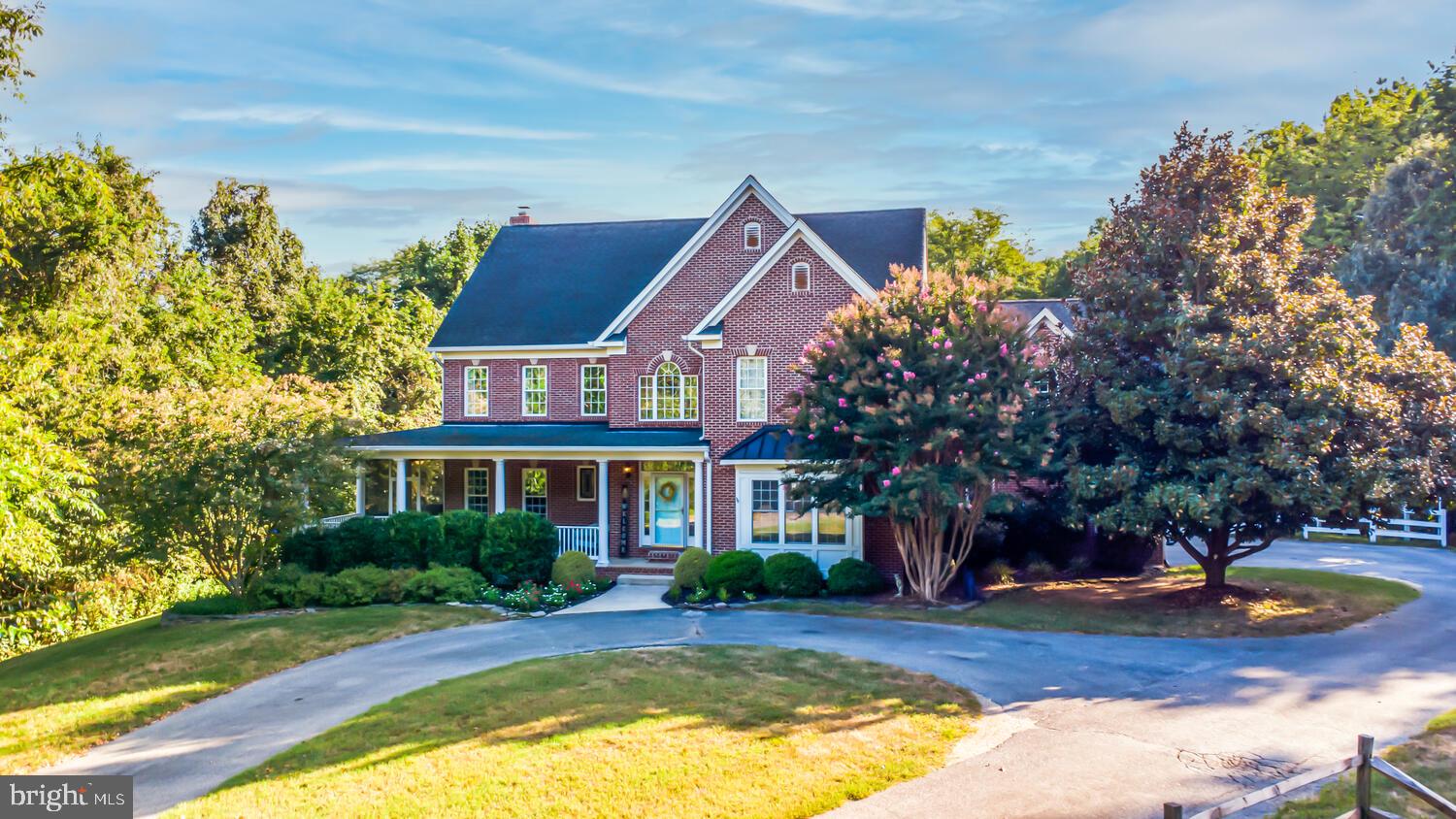 This spacious four-bedroom, two-and-a-half-bath home offers the perfect blend of comfort, style, and functionality. From the moment you step inside, you're welcomed by an open-concept floor plan that seamlessly connects the main living areas, creating a bright and inviting atmosphere ideal for both everyday living and effortless entertaining.

The well-appointed kitchen with stainless steel appliances, double ovens and granite counter tops flows beautifully into the living room and is connected to the formal dining room by a convenient butler's pantry, making it truly the heart of the home. The spacious living room features a stunning brick fireplace with a wood stove insert and opens to a screened porch, providing the perfect place to relax and enjoy the outdoors in comfort.

A dedicated home office offers an ideal space for remote work, studying, or managing everyday tasks. Upstairs, you'll find four generously sized bedrooms, including a serene primary suite with a private en-suite bath designed for relaxation. In addition to the bedrooms, a large bonus room offers exceptional flexibility and can easily serve as a craft room, playroom, media room, home office, or even a fifth bedroom to suit your lifestyle. The secondary bedrooms share a well-appointed full bath, while a convenient half bath on the main level adds comfort for guests.

Outdoor living is equally impressive, featuring an adjoining deck overlooking a private, fenced backyard with plenty of space for grilling, outdoor dining, entertaining, or simply unwinding in the sunshine. The unfinished basement offers endless possibilities, whether you envision a home gym, recreation room, workshop, or abundant storage.

Thoughtfully designed with spacious living areas, versatile spaces, and room to grow, this exceptional home is ready to accommodate your lifestyle for years to come.
