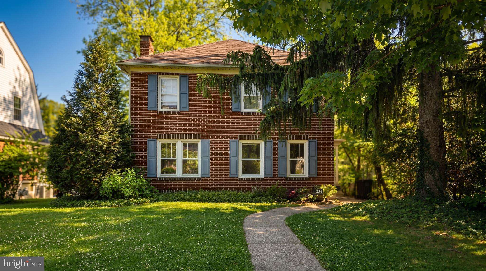 This beautifully maintained 1930s brick home in the heart of the Borough of State College is just steps away from downtown and everyday convenience. Located within walking distance of downtown State College, Penn State University, parks, restaurants, and local shops, this 4-bedroom, 2.5-bath residence offers a rare opportunity for homeowners and investors alike.

From the moment you arrive, you'll appreciate the home's classic brick exterior, mature trees, inviting front porch, and charming curb appeal. Inside, original details blend seamlessly with thoughtful updates, including hardwood floors, rich woodwork, built-in shelving, and abundant natural light throughout. The spacious living room features a cozy brick fireplace flanked by custom built-ins, while the updated kitchen offers ample cabinetry, modern appliances, and a bright eat-in dining area overlooking the picturesque surroundings.

The flexible floor plan provides plenty of space for family, guests, home offices, or roommates. The private 2nd floor suite with its own balcony and bath adds versatility and appeal. Outside, enjoy the peaceful, tree-lined setting, expansive yard, and off-street parking. A partially finished attic space can be used for whatever you can imagine.

Adding to its value, this home also holds a rental permit and is currently tenant-occupied, with the lease ending and tenants vacating at the end of July, offering flexibility for owner-occupants, investors, or those planning a future move.

Whether you're looking for a charming primary residence, a game-day retreat, or an investment property in one of State College's most sought-after locations, this Borough gem combines historic character, walkability, and exceptional opportunity in one package.