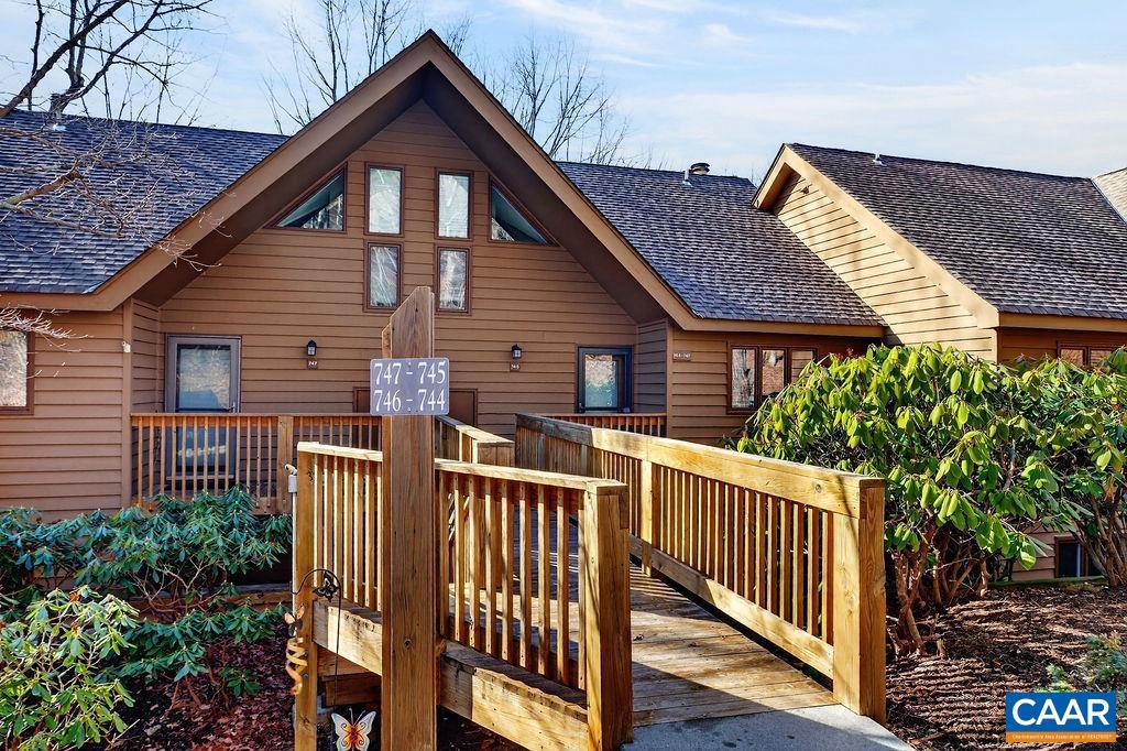This condominium is centrally located and has been lovingly maintained.  It is near the private Laurelwood pool and the Wintergreen market.  The straight-in entry makes access very comfortable for all ages.  It is walkable to the ski slopes, restaurants, and all of the amenities of Black Rock Village.  An ideal location for family and friends to enjoy the Wintergreen lifestyle. There are cathedral ceilings that give a sense of space and provide abundant light.    A perfect retreat to enjoy with family and friends.,Fireplace in Living Room
