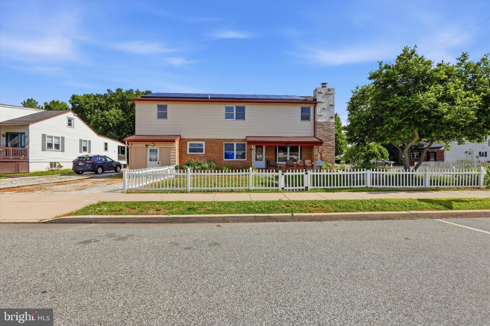 Welcome to 505 W 2nd St! SItuated on a private corner lot across the street from West End Yacht Club, this home has so much to offer. With over 2400 sqft there are 5 bedrooms, 3 full bathrooms, 2 family rooms and plenty of space for the family.  On the first floor you have hardwood floors leading you through the living room to the kitchen, laundry room, 2 bed rooms and hall bathroom. The second floor has 3 large bed rooms with plenty of closet space, 2 full baths of which on is a primary suite and a central family room or kids chill area. Outside you have a large fenced yard perfect for the family pet or for your privacy. Schedule your showing and enjoy your new home just in time for summer. 

Other amenities include solar panels offering cheaper electric bills, storage area as well as convenient locations. Across from the West End Yacht Club, a short walk to the farmers market and community park.  Summer concerts have started and the neighbors are ready for you to join them.