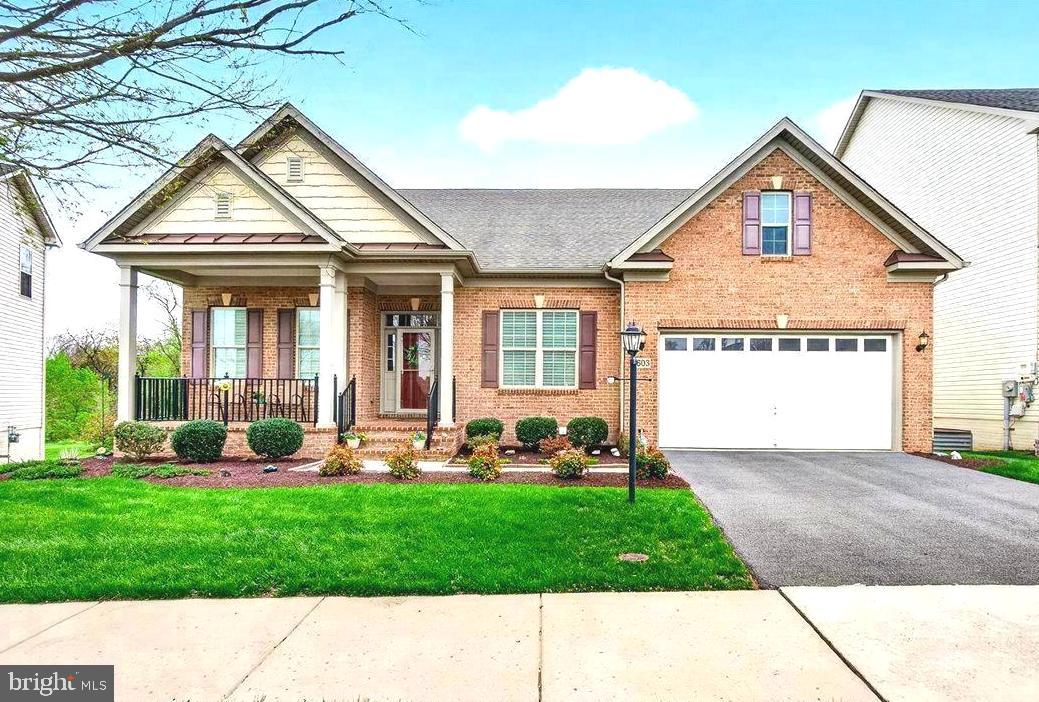 This stunning luxury ranch-style home located in the highly sought-after Landsdale community and a short walk to the pool, parks and clubhouse offers the very best in single-level living plus an expansive finished lower-level providing plenty of versatile space. Featuring 9-foot ceilings throughout, the home welcomes you with a gorgeous octagonal foyer, elegant crown moldings, and rich hardwood floors that set the tone for refined comfort.

The gourmet kitchen is a true centerpiece, boasting a gas cooktop, double wall ovens, granite countertops, rich cabinetry, and a large island ideal for entertaining. It opens seamlessly into a light-filled, spacious living area with a cozy gas fireplace and direct access to a large composite deck.

The primary suite is a private retreat complete with tray ceiling, a generous walk-in closet and a luxurious en-suite bath featuring a soaking tub, double vanities, and a walk-in shower.  A lovely formal dining room, two additional bedrooms, a full hall bath with tub, comfortable office/den, a mud room leading to an attached two car garage and a convenient laundry room round out the main floor.

A huge, finished walk-out lower level provides additional living space including a large recreation area, a fourth bedroom with walk-in closet, a full bath, a finished storage room, and a huge utility/storage area.

Outdoor living is just as impressive, with a spacious composite deck overlooking a beautifully landscaped lot, an attractive paver patio, and a welcoming covered front porch all perfect for relaxing or entertaining. 

The Landsdale community provides excellent schools, beautiful resort style community pool, meeting rooms, multiple playgrounds, ball courts, walking paths and scenic ponds. Convenient to I-270, I-70, and amenities offered in thriving Urbana and Historic Frederick. 

Elegant ranchers like this one do not come on market often so don't miss out! Virtual staging used in some photos.
