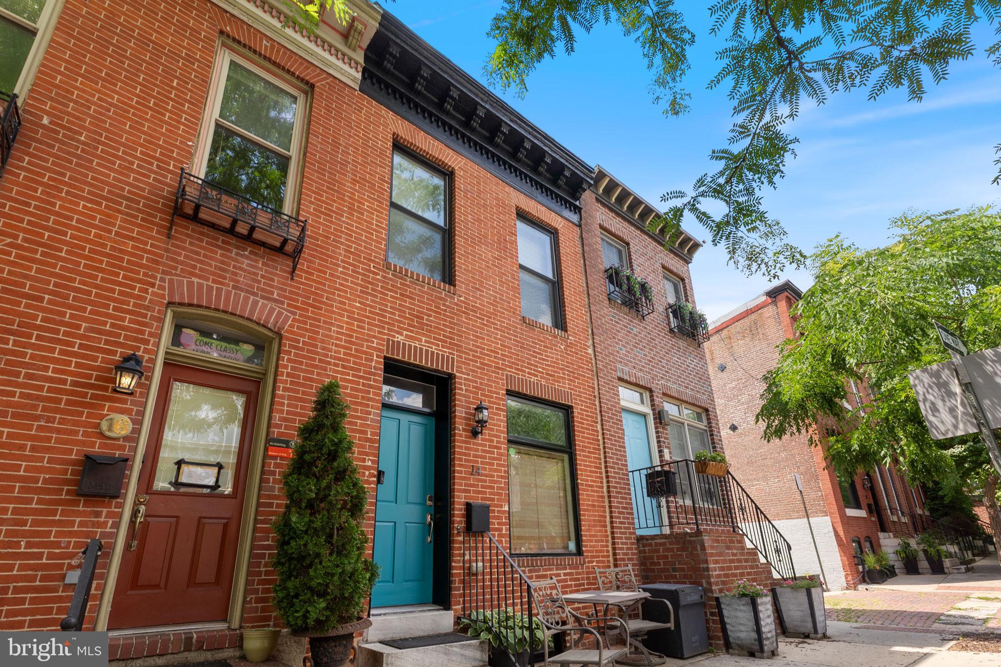Welcome to 14 S. Collington Avenue, a beautifully renovated Federal-style rowhome in the heart of historic Butchers Hill. This spacious three-bedroom, three-full-bath home offers the perfect blend of classic Baltimore charm and modern convenience. Features include exposed brick, hardwood floors, a designer kitchen with granite countertops, stainless steel appliances, and an open layout ideal for everyday living and entertaining.

The home was completely gut-renovated in 2014. Recent improvements provide added peace of mind, including a roof sealing in September 2025, a ring camera system, Hue Bluetooth lighting,  a new water heater installed in September 2024, roof deck upgrades completed in June 2026, and a new LG washer installed in January 2025.

The fully finished lower level provides a third bedroom, a full bath, and flexible living space, perfect for guests, a home office, or a recreation room. Upstairs, enjoy generously sized bedrooms and updated bathrooms. Step outside to the rooftop deck with sweeping views of the Baltimore skyline, or take advantage of the private rear parking pad for convenient off-street parking.

Located blocks from Johns Hopkins Hospital, Patterson Park, Fells Point, and Canton, this home offers easy access to some of Baltimore’s best dining, shopping, waterfront attractions, and commuter routes. An outstanding opportunity to own a move-in-ready home in one of Baltimore’s most sought-after neighborhoods.