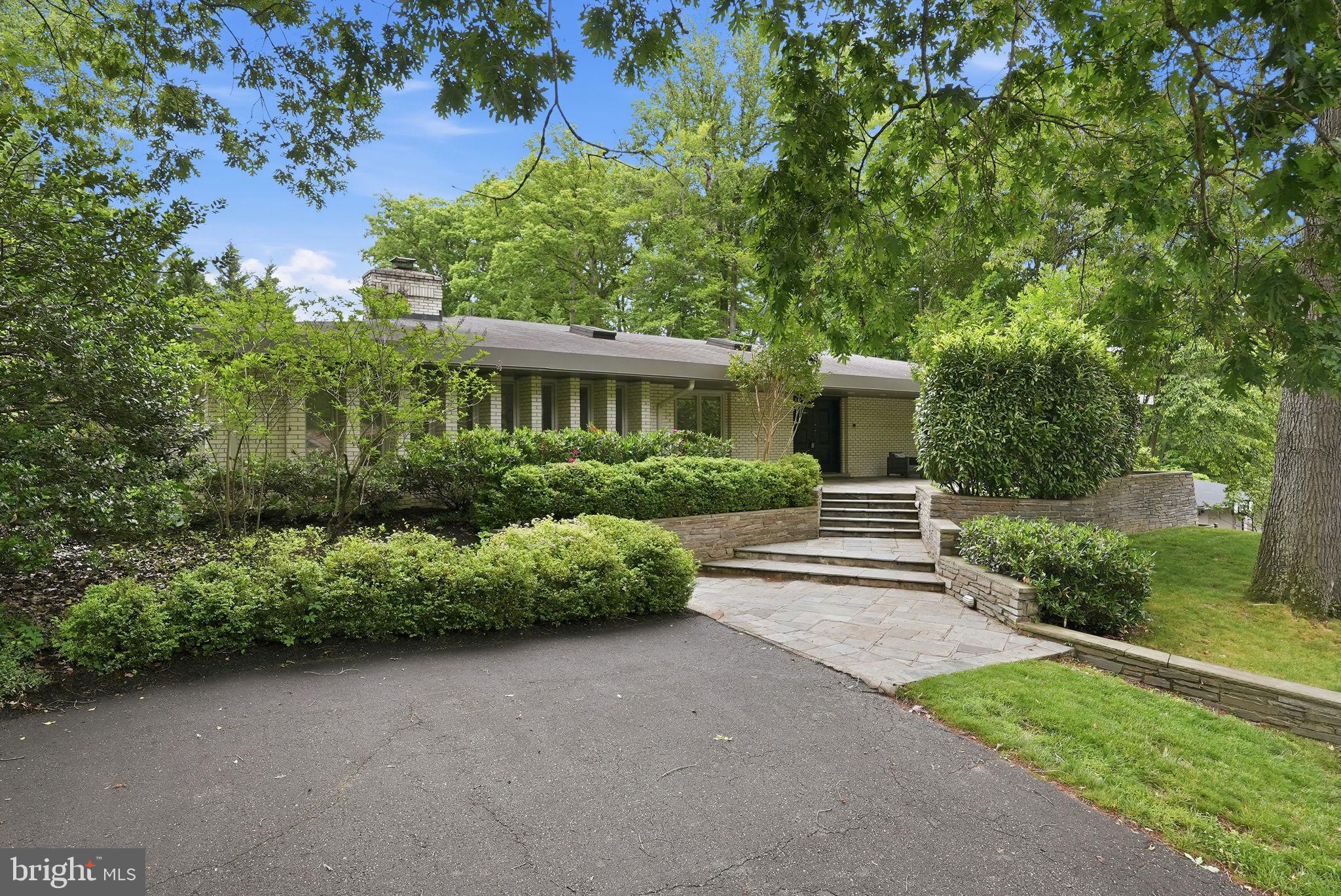 **NEW ON MARKET ** Mid-Century Modern Perfection in Bannockburn! 
Enjoy the best of main-level living in this stunning, updated 5-bedroom, 4.5-bathroom Mid-Century Modern home. Located in the highly sought-after Bannockburn neighborhood and in Walt Whitman High School district, this bright and airy home is completely move-in ready.

The main floor features a beautifully updated chef's kitchen, an inviting family room centered around a fireplace, and beautifully renovated bathrooms. The expansive, fully walk-out lower level offers incredible additional living space, featuring a private guest bedroom suite perfect for visitors and an expansive recreation room. Complete with a spacious, level, fenced in yard with large patio, this home perfectly blends classic architectural charm with modern luxury.