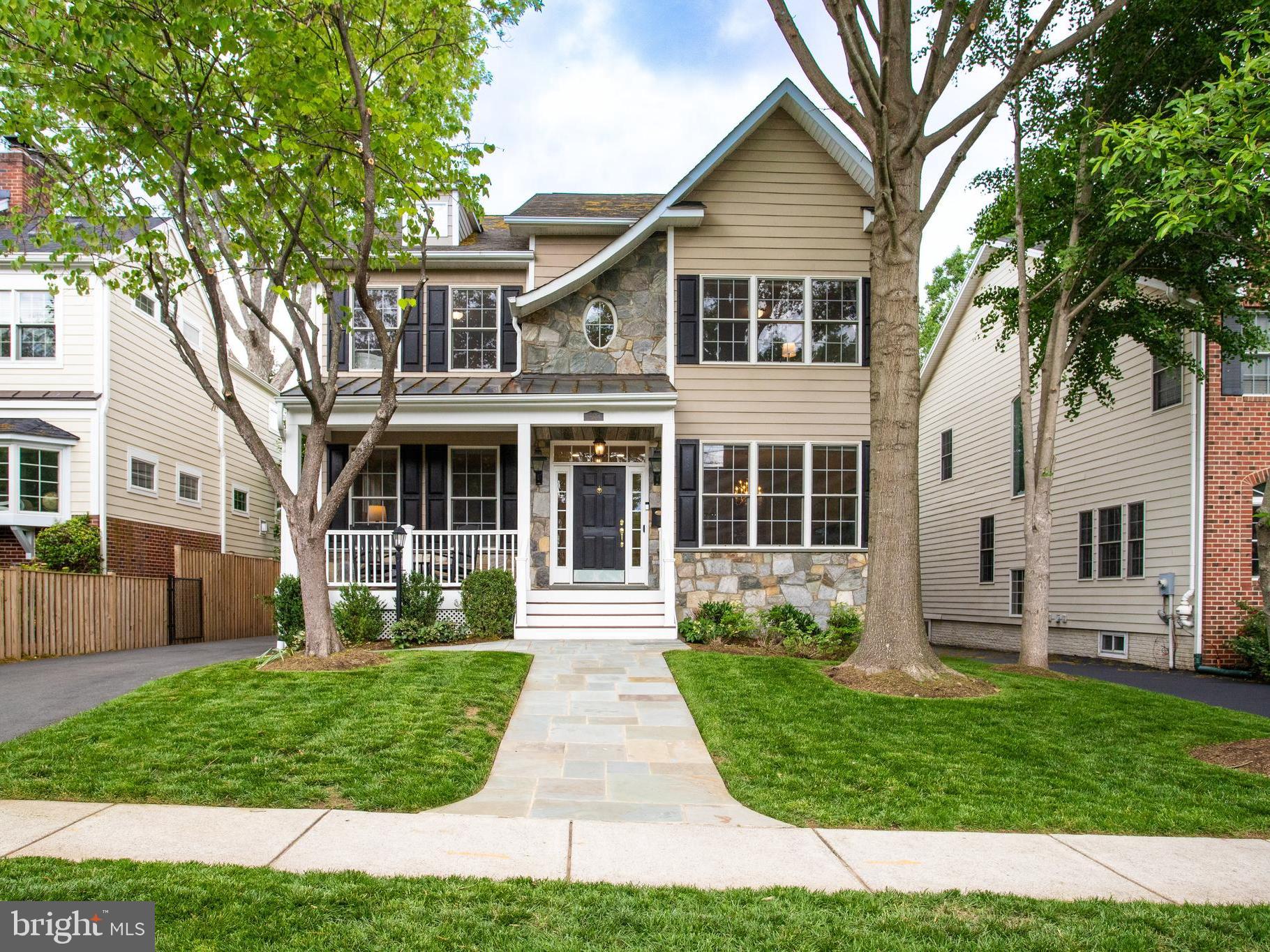 Brilliantly updated and perfectly positioned in the heart of Arlington’s beloved Westover, this 5BR/4.5BA, 4,790 sqft craftsman-style home offers the warmth, character, and modern comfort every homeowner dreams of. It welcomes you with timeless curb appeal, mature landscaping, a charming covered front porch, gas lanterns and a brand-new asphalt driveway (2024) set the tone for what’s to come.

Step inside and instantly feel at home. From the rich hardwood floors and soaring 9’ ceilings to the custom molding and elegant flow of living spaces, every detail invites both comfort and connection. Gather with loved ones in the sun-drenched family room around the fireplace, host memorable holidays in the formal dining room, or simply unwind in the peaceful front living room. The main level also includes a convenient laundry room and mudroom adding everyday ease and a perfect drop zone for bags, coats, and muddy boots.

At the heart of the home is a show-stopping, open-concept gourmet kitchen with white cabinetry, sleek quartz countertops, and stainless steel appliances. Whether it’s pancake breakfasts or wine-filled evenings with friends, this is a space made for living and laughter. Step out back to a private, fully fenced yard where joy unfolds. Grill out on the brand-new Trex deck (2024), watch kids play on the playset, or enjoy the convenience of a detached two-car garage.

Upstairs, retreat to your dreamy primary suite with tray ceilings, two walk-in closets, and a spa-like en suite that feels like a personal sanctuary. Two additional bedrooms share a stunning new Jack-and-Jill bathroom—part of a $120K structural renovation completed in 2024 while a fourth bedroom enjoys private access to its own full bath.

Downstairs, the finished lower level offers space to truly spread out. Think movie nights in the recreation room, quiet work-from-home days in the office, or cozy stays for guests in the private bedroom and bath. You’ll also find practical perks: two Carrier HVAC systems (2016), a newer water heater with UV filtration (2021), and fresh landscaping and flagstone (2023).

And then there's the location. Just blocks to the Metro and I-66, with easy access to both Reagan and Dulles Airports. Close to DC, yet tucked into a tight-knit, tree-lined community. Blocks to the Westover shops, enjoy coffee or a pint with neighbors, take part in the beloved Sunday Farmers Market, or join in the fun of neighborhood happy hours, Halloween block parties, and community yard sales. You're only moments from all the charm and dining of Falls Church City. Plus, Tuckahoe, Swanson, Yorktown!

This is more than a house. It’s a place where memories are made, traditions are born, and life is truly lived. Welcome home.