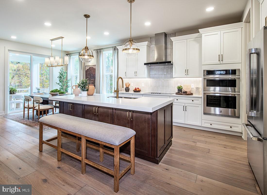 This exceptional Pickering Newhaven quick move-in home offers a refined blend of thoughtful design and elevated finishes, featuring 4 bedrooms and 3.5 baths. A beautifully enhanced interior showcases an open railing in lieu of a half wall, creating a more expansive and connected living space, along with oak stairs featuring painted risers for a timeless, sophisticated look.
The well-appointed floor plan includes an alternate primary bath design, offering a spa-like retreat tailored for comfort and relaxation, as well as a versatile loft that provides additional living space ideal for a variety of needs. A striking linear fireplace with a fan kit serves as a focal point in the main living area, adding both warmth and modern elegance. Additional highlights include rough plumbing in the basement, an electric car charger pre-wire, and a desirable walkout basement home site that enhances natural light and outdoor accessibility.
Outdoor living is elevated with a luxury outdoor living space, ideal for seamless indoor-outdoor entertaining. This home is scheduled for completion in late September to early October, presenting a wonderful opportunity to move into a beautifully crafted Toll Brothers residence with premium upgrades already in place. You cannot beat this location with access to all shopping and dining in the local area. The community is also convenient to major highways including I-76, Routes 422, 202, and the PA Turnpike. *Photos are of model home.