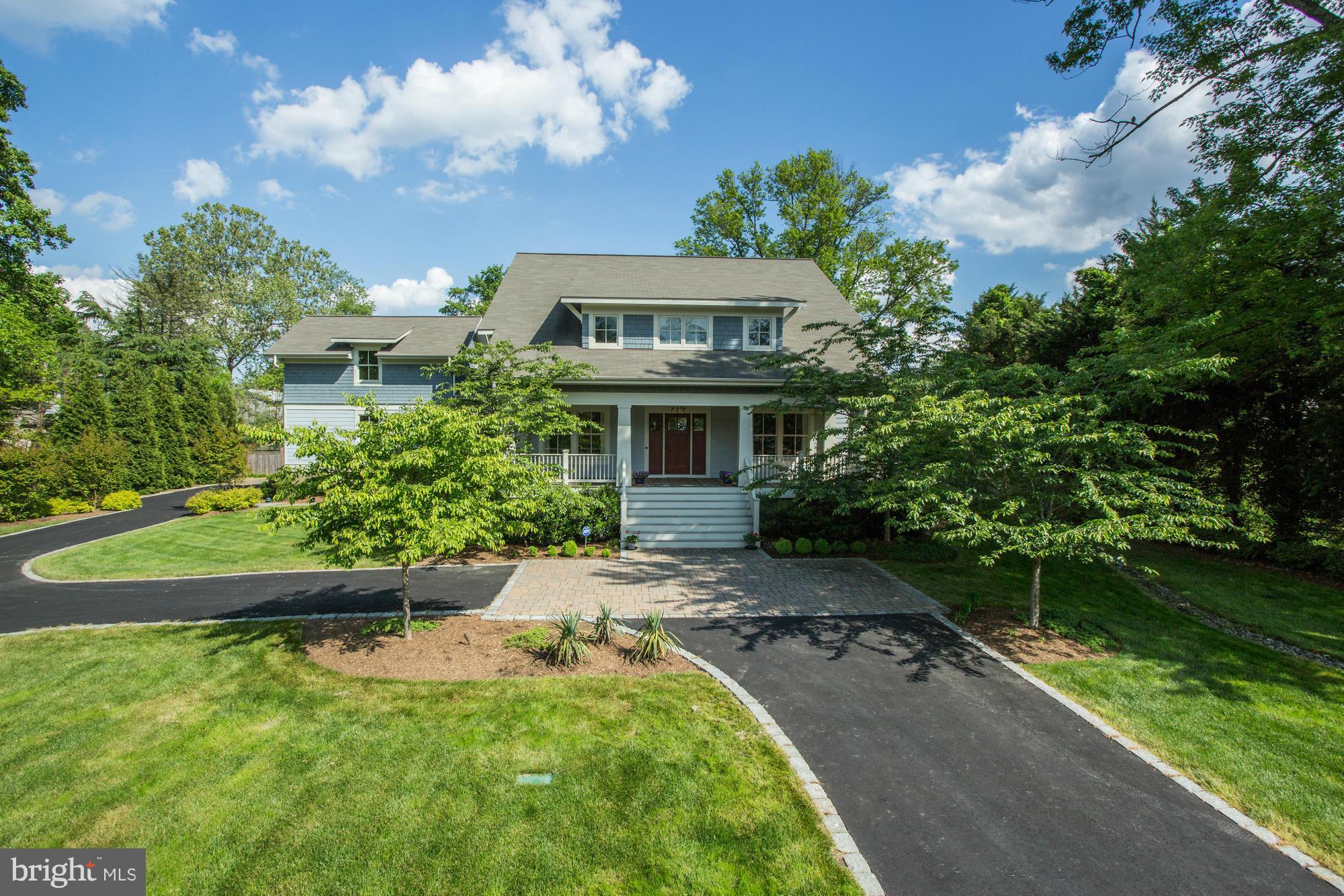 Custom built Morris-Day home on over 1 acre of beautifully landscaped privacy.  Gourmet kitchen with Wolf, Subzero, 2 sinks and granite. Grand/Wide staircases, custom wood floors, Media Room and Spa-like Master suite! Side loading 3 car garage & 2 laundry rooms. Middleburg Estate-like setting - yet only minutes to DC, Arlington, McLean and Tyson's.