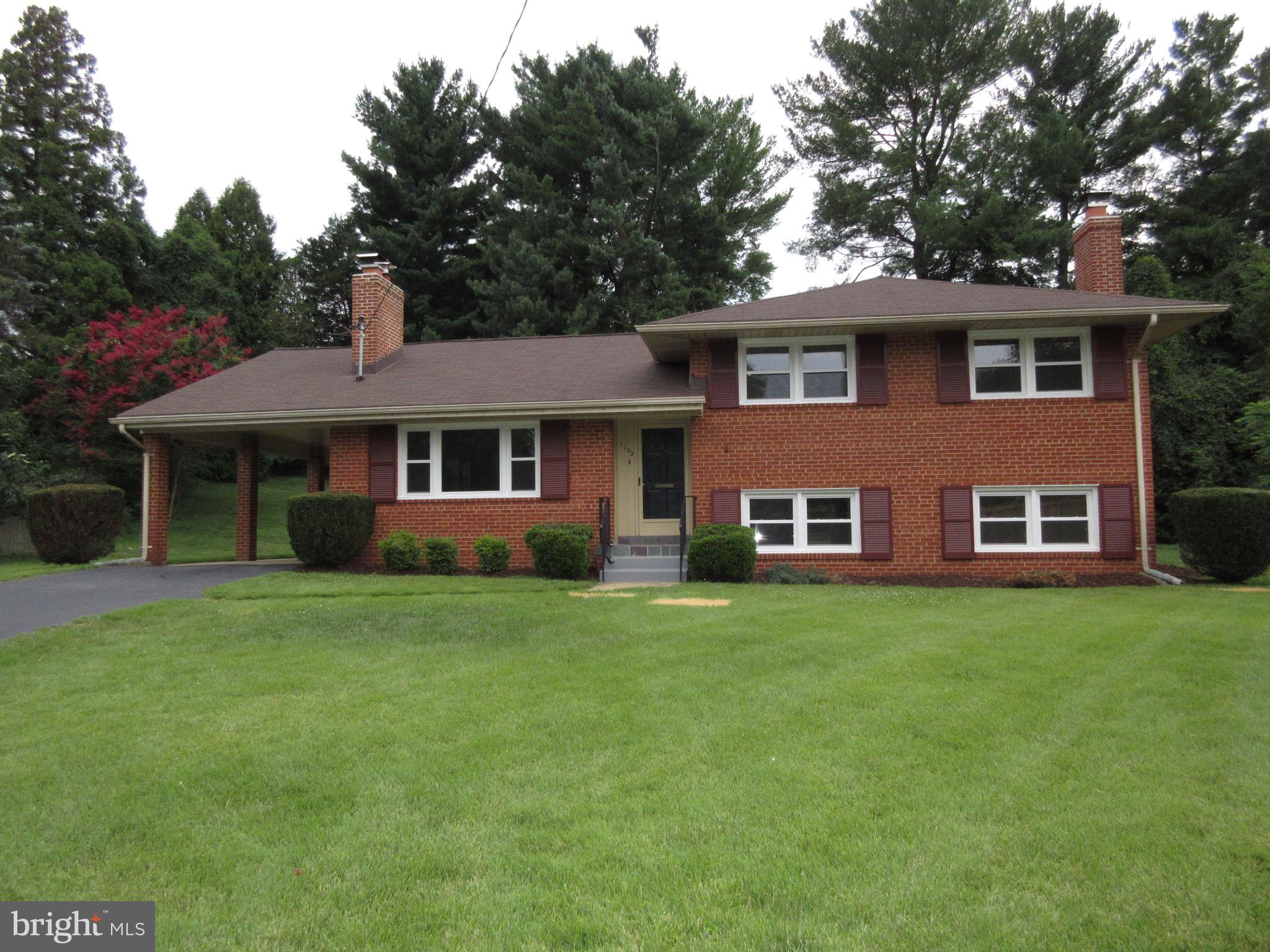 This home Sparkles!New Paint. New lighting fixtures. Updated baths. Kitchen Facelift. New Carpeting etc. Large home with really nice yard. Carport. Long drive way for lots of cars. Great location. HUGE lower level storage space perfect for kids play room or storage. Nice open floor plan.Brand New Energy efficient replacement Windows. Super Clean and Ready for new tenants.