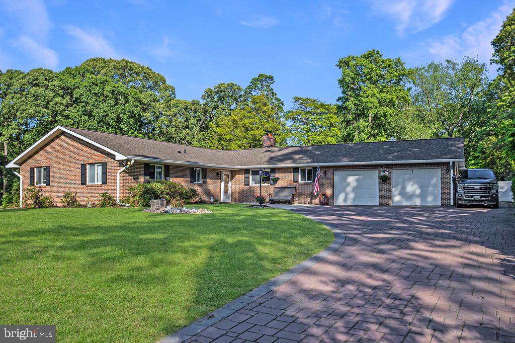 Prepare to fall in love!! This is an exceptional opportunity to live in the water privileged community of Offer deadline 5/21/2016 at 6:30 pm  Sylvan View.  Situated on  .76 acres, this approx. 3,800 finished SF all brick rancher offers something for everyone.  Cooks will love the expansive eat-in kitchen with stainless appliances, walk-in pantry, center island, large eating area, stone fireplace and wood floors. Just off of the kitchen, is a family room with a cathedral ceiling and full  walls of glass overlooking the inground pool and huge rear yard.  Entertain the whole family for the holidays in the 27 x 20 living room / dining room combo.  The primary bedroom offers new carpet, a walk in closet with built in shelving, crown molding and a full bath with shower.  
  
 The lower level offers a 25 x 36 family room / kitchenette area combined with a full bath, 4th bedroom and bonus room for the perfect getaway,  an au pair suite or extended family guest quarters .  
The 2-car garage has direct access to the basement. 
Outdoor entertaining is enhanced with an inground pool, an oversized,  flat, rear yard complete with a vinyl privacy fence.  
For the hobbyist,  the detached 24 x 24 shed with electric is the perfect workplace . 
Don't miss the deeded boat slip, community beach, boat ramp and playground.  
The first floor offers a laundry room and garage access.  No electric worries with the whole house generator.  
Love where you live!  Vacation at home!  
HOA $100. plus tax special $360.  annually Smaller shed sold as is. Wine cooler excluded.