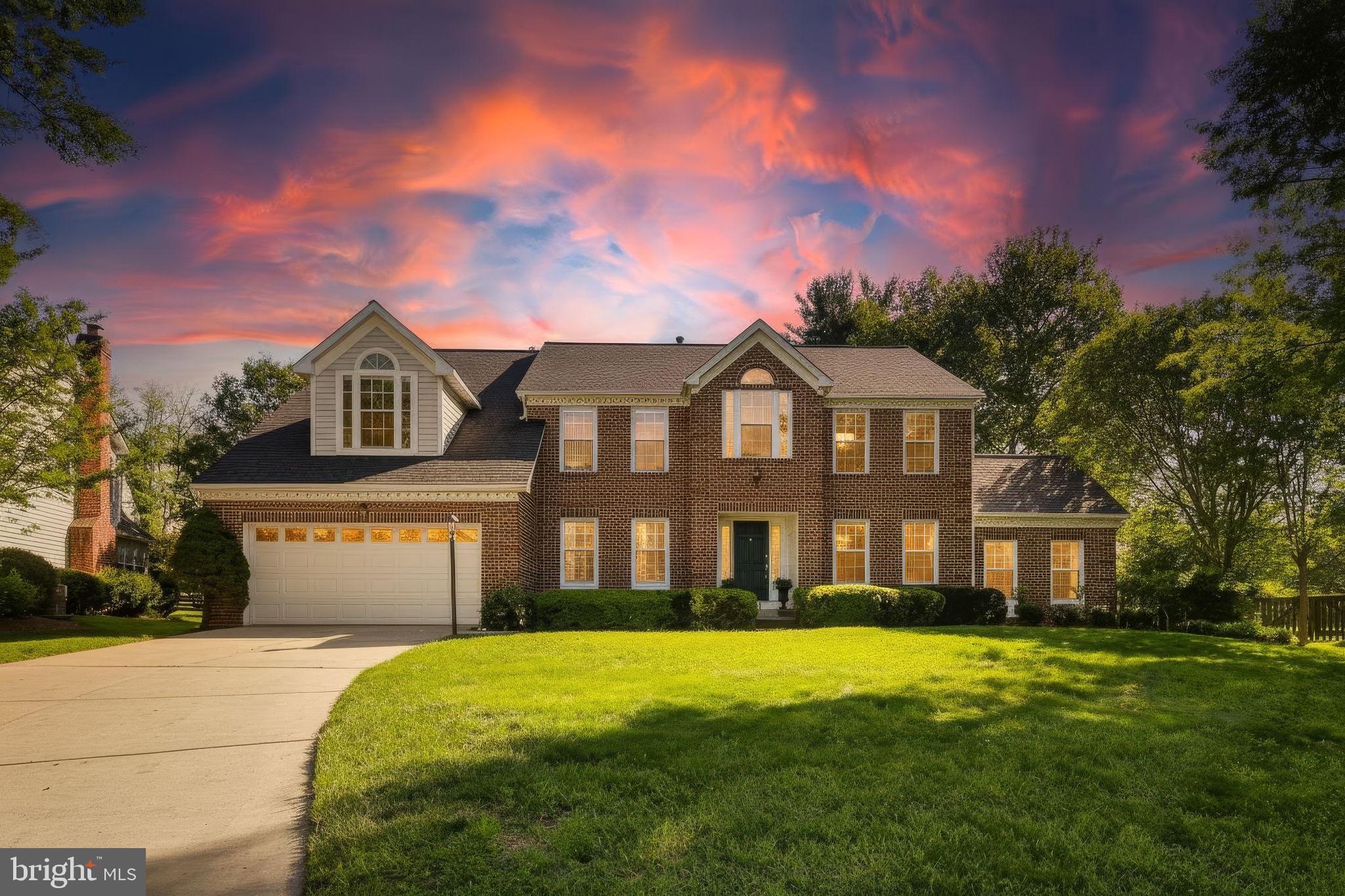 Lovingly maintained by its original owners, this exceptional brick-front Colonial offers a rare opportunity to own one of Quince Haven's largest and most sought-after floor plans. Nestled on a quiet cul-de-sac with beautifully spaced homes and mature landscaping, the setting provides a sense of privacy, openness, and neighborhood charm.

A stately brick façade, elegant circle-top windows, and a new garage door create impressive curb appeal. Inside, fresh paint throughout the home and brand-new carpeting on the upper level provide a bright, clean, move-in-ready interior. With over 5,000 square feet of finished living space, the home combines impressive scale with an intuitive layout that feels both spacious and welcoming.

A dramatic two-story foyer welcomes you inside, opening to elegant formal living and dining rooms, a sun-filled sunroom, and a soaring two-story family room featuring a wood-burning fireplace with a classic brick surround. Hardwood floors extend throughout the main level and continue through the upper-level hallway, adding warmth and timeless appeal. The open floor plan allows natural light to flow throughout the main living spaces while creating comfortable areas for both everyday living and entertaining.

The spacious kitchen offers solid wood cabinetry, a large center island, double wall ovens, a gas cooktop, and a bright breakfast area that opens seamlessly to the family room. A private main-level office or optional bedroom, powder room, and conveniently located laundry room complete the main level.

Upstairs, the expansive owner's suite features vaulted ceilings, a sitting room, a large walk-in closet, and a private bath. Three additional generously sized bedrooms and a well-appointed hall bath complete the upper level, while views overlooking the family room below enhance the home's open and airy feel.

The fully finished lower level provides exceptional flexibility with a large recreation room, expansive additional living space, a theater, media, or game area, and a full bath—ideal for entertaining, fitness, hobbies, guest accommodations, or multi-generational living.

Meticulously cared for and thoughtfully maintained, this home offers the rare opportunity to move right in while personalizing finishes over time to reflect your own style and vision. Combined with its premier floor plan, generous room sizes, and exceptional cul-de-sac location, 12411 Rousseau Terrace is a standout offering in one of North Potomac's most desirable communities.

Residents enjoy community amenities including tot lots, playgrounds, walking and jogging paths, and tennis courts. Ideally located just minutes from Kentlands, Downtown Crown, and Rio, with easy access to I-270, Route 28, and the ICC, this home offers the perfect blend of space, comfort, convenience, and long-term potential.