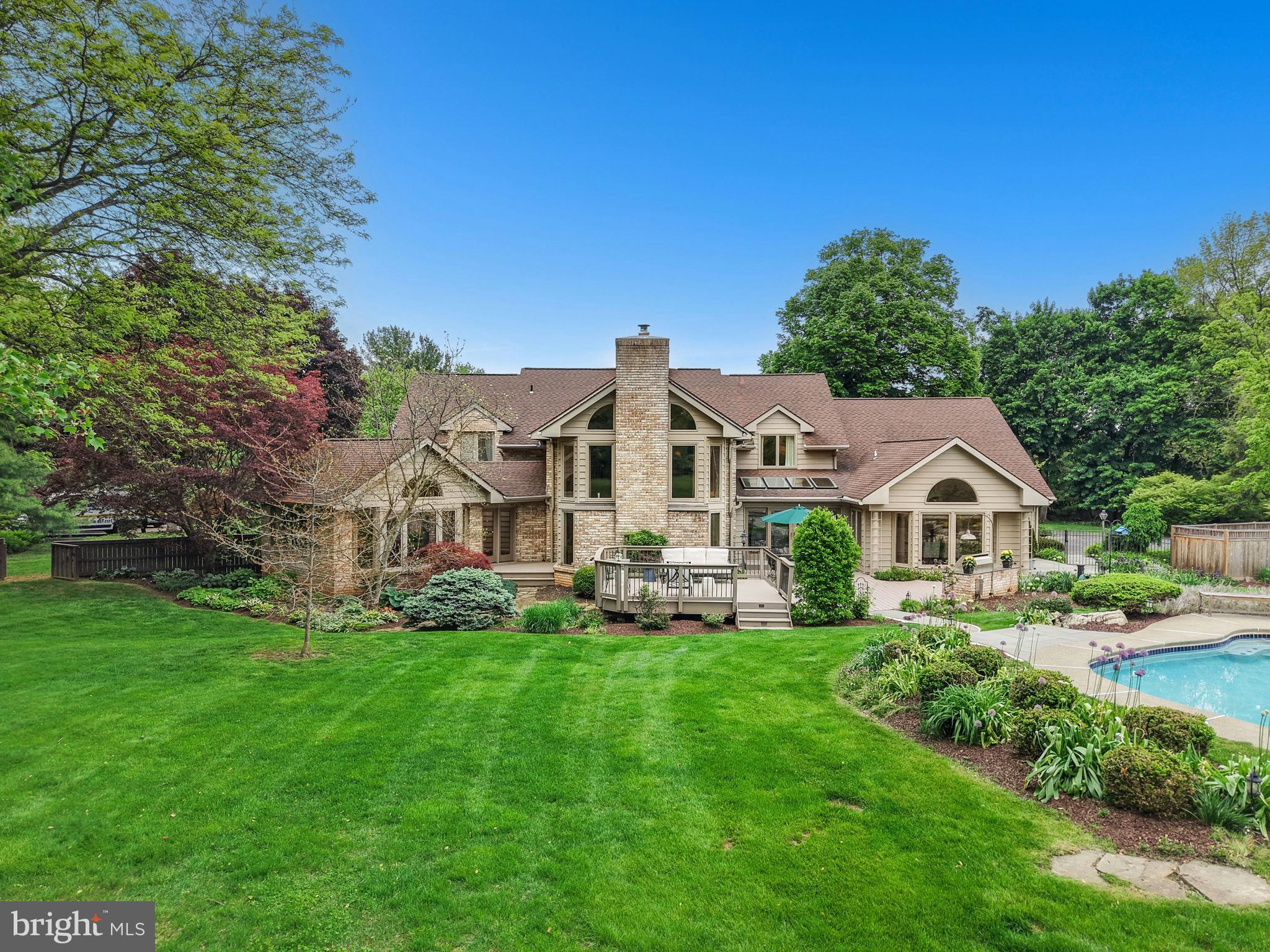 Set at the end of a picturesque private lane, on a quiet cul de sac, this stunning home boasts over 8,300 square feet of living space and may well be one of the best houses you have ever seen.
     Walls of glass bathe the first floor in light and showcase a magical backyard oasis, with private pool and luscious landscaping. The views and amenities from every room are amazing. An impressive two-story family room is anchored by a commanding floor-to-ceiling stone fireplace and walls of cherry cabinetry. The gourmet kitchen is a breathtaking blend of aesthetics and functionality, with abundant sunshine as backdrop for glass-front cabinetry and a lovely breakfast area with skylights and cathedral ceiling. A first-floor master suite has luxurious bath and adjacent office with cherry cabinetry.
     Upstairs, cleverly designed bedroom suites of 4 bedrooms, allow family and guests to feel indulged with space and privacy, while a fully finished lower level offers a variety of rooms for every additional hobby. Close to Historic Bethlehem and the Lehigh Valley’s finest Colleges and Universities, Bridle Path is a one-of- a-kind property in an exceptional location.