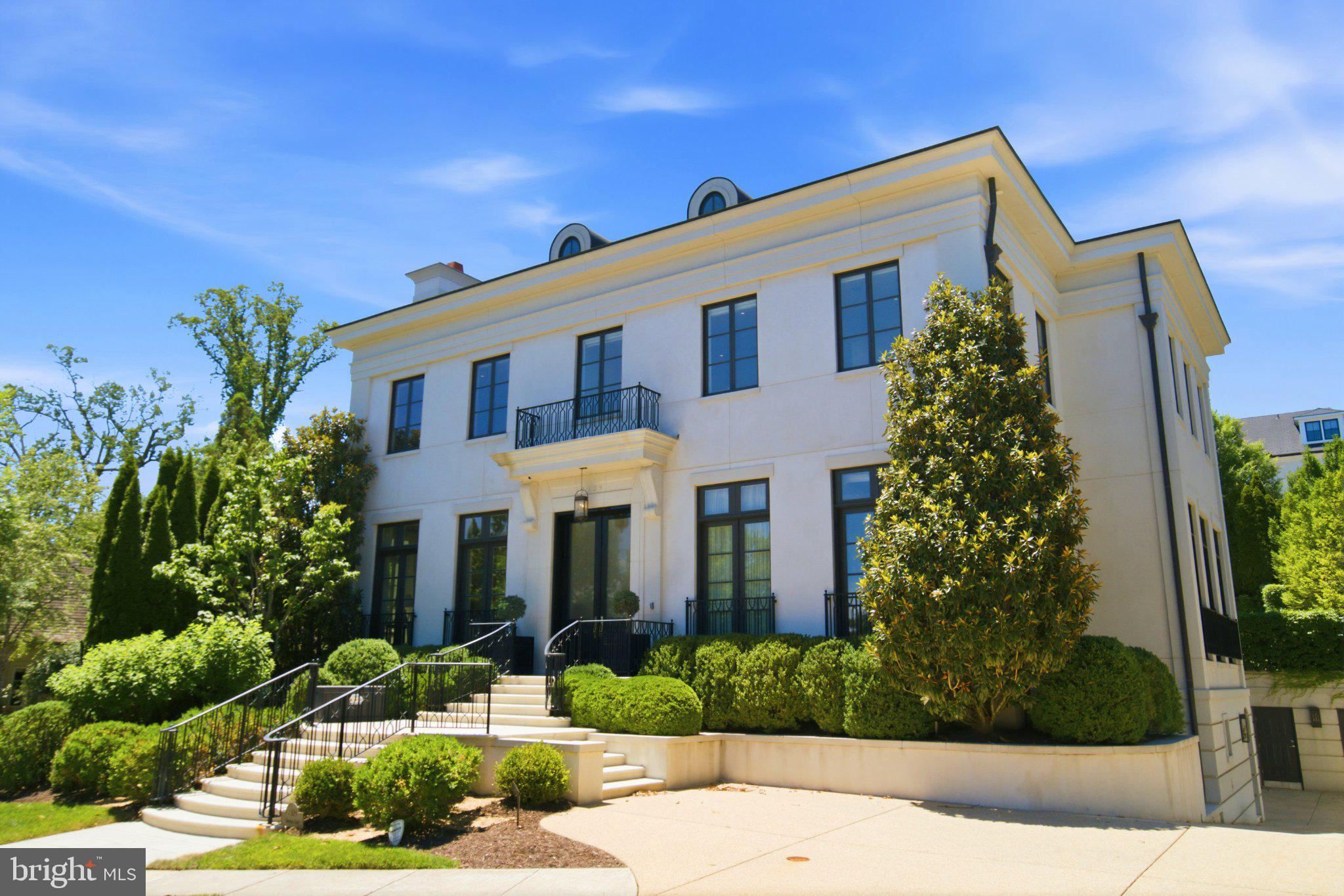 An architectural masterpiece exuding style, elegance and grandeur this magnificent stucco and limestone residence with approximately 10,700 SF of exquisitely finished living space  impresses at once with its imposing regal façade prominently situated to command attention in the prestigious enclave of Phillips Park. Designed by the renowned architectural firm of Barnes -Vanze and constructed by the acclaimed Gibson Builders  every inch has been painstakingly thought out to display a subtle beauty both inside and out. The home was built in 2013 and in 2024 was  renovated, fine tuned and decorated to perfection. This 5- bedroom, 5 full bath and 4 half- bath home is one of the largest homes in Phillips Park and features the highest quality finishes and was created with both grand scale entertaining and comfortable family living in mind.

Gently rising limestone stairs provide a sublime introduction for entry to the home where, once inside, a circular vestibule with scalloped accent walls leads to a dramatic 35 -foot long, wide gallery with 11- foot ceilings with a view to the private rear garden. The main floor features large principle rooms wonderful for entertaining and is perfectly designed to allow for an effortless flow. A spacious reception room with floor-to- ceiling windows, sleek marble fireplace and a semi-circular bar with an escalloped marble base mirroring the detail of the entry vestibule seamlessly connects with a banquet sized dining room perfect for the most elegant of dinner parties. From the dining room a wide double door leads to a stunning step-down living room with its 12- foot ceilings, marble fireplace and massive walls of floor-to-ceiling windows and French doors providing easy access to the rear garden. A spacious gourmet kitchen with center island includes Miele, Subzero and Wolf stainless steel appliances and opens to an adjacent and bright breakfast room with banquette seating. The main floor continues with a generously sized home office, cozy den and two powder rooms.

An elegant circular staircase ascends to the second level  boasting 11-foot ceilings and providing access to 4 large bedrooms and 4 full bathrooms. The spacious primary bedroom features a luxurious marble primary bathroom with separate water closets and an over-sized custom walk-in-closet.  A second bedroom with en-suite bathroom includes a second room- sized custom walk-in closet. Two more large guest bedrooms each with en-suite bathrooms along with a laundry room complete this floor.

The lower-level seduces with an intimate lounge /media room featuring surround sound, separate wet bar and adjacent powder room. This level also includes a large bedroom with en-suite bathroom and walk-in-closet, laundry room, and is connected to a two-car garage. An additional sub lower- level leads to a spectacular, fully equipped state-of-the-art gym.

A tranquil and private rear garden features lush and evergreen mature plantings and provides ample room for grand scale outdoor entertaining on an expansive limestone patio which steps up to a shimmering swimming pool and jacuzzi, complete with separate pool house with powder room. Additional amenities include a commercial -grade elevator servicing all floors, Sonos sound system,  state of the art security cameras and security system, numerous smart home features and applications,  a generator plus various other luxury conveniences. This extraordinary residence is being offered as a “turn-key” fully-furnished property (art ; objet d’art excluded).