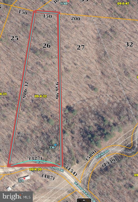 ACRES OF RAW LAND – READY TO BUILD!

Discover 5.06 acres of primarily wooded land located in the desirable Delray Heights Subdivision. This property offers the perfect blend of privacy and convenience, with easy access right off the road. Whether you’re looking to build your dream home or place a mobile home, this lot provides endless possibilities. Enjoy the peaceful setting surrounded by nature, with a small shed already on-site.  On the property if you walk through it to the back there is a cleared area and you will see the property stakes. When you see the shed and dilapidate mobile that is the property. 

Directions: From Winchester, take Rt. 50 West approximately 28 miles. Turn left onto Rt. 29 South and proceed 6.7 miles. Turn right into Delray Heights—property is the first lot on the right after the power lines. Look for the sign and small barn/shed.

Legal Description: 5.06 AC, Tract 26, Delray Heights Subdivision.