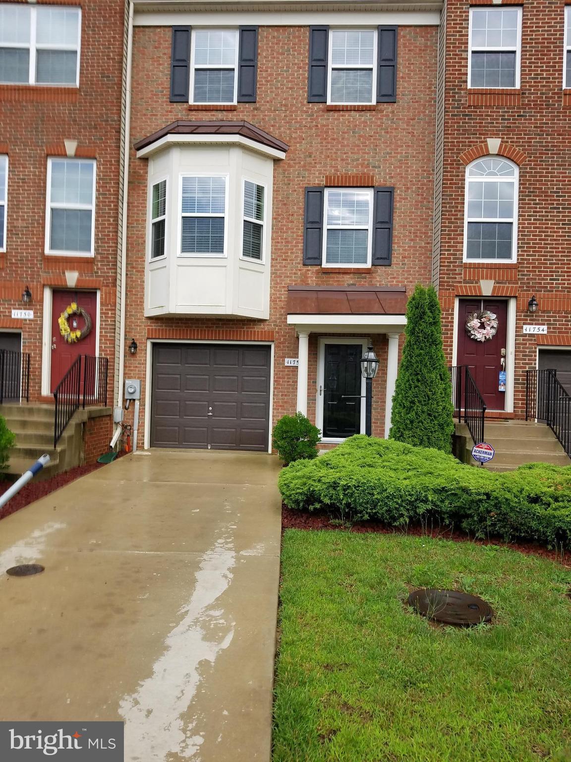 Beautiful Brick Front 3 Level Town House with garage.  New Carpet and Paint Throughout, Eat in Kitchen, Kitchen Island, Sliding Glass Door leading to Large Deck, Perfect for Grilling and Entertaining.  Master Bedroom with Vaulted Ceiling, Walk in Closet, Master Bath with Dual Vanity and Stand Up Shower.  Rec Room on Lower Level with access to Large Fenced Backyard.   Shows Like NEW!