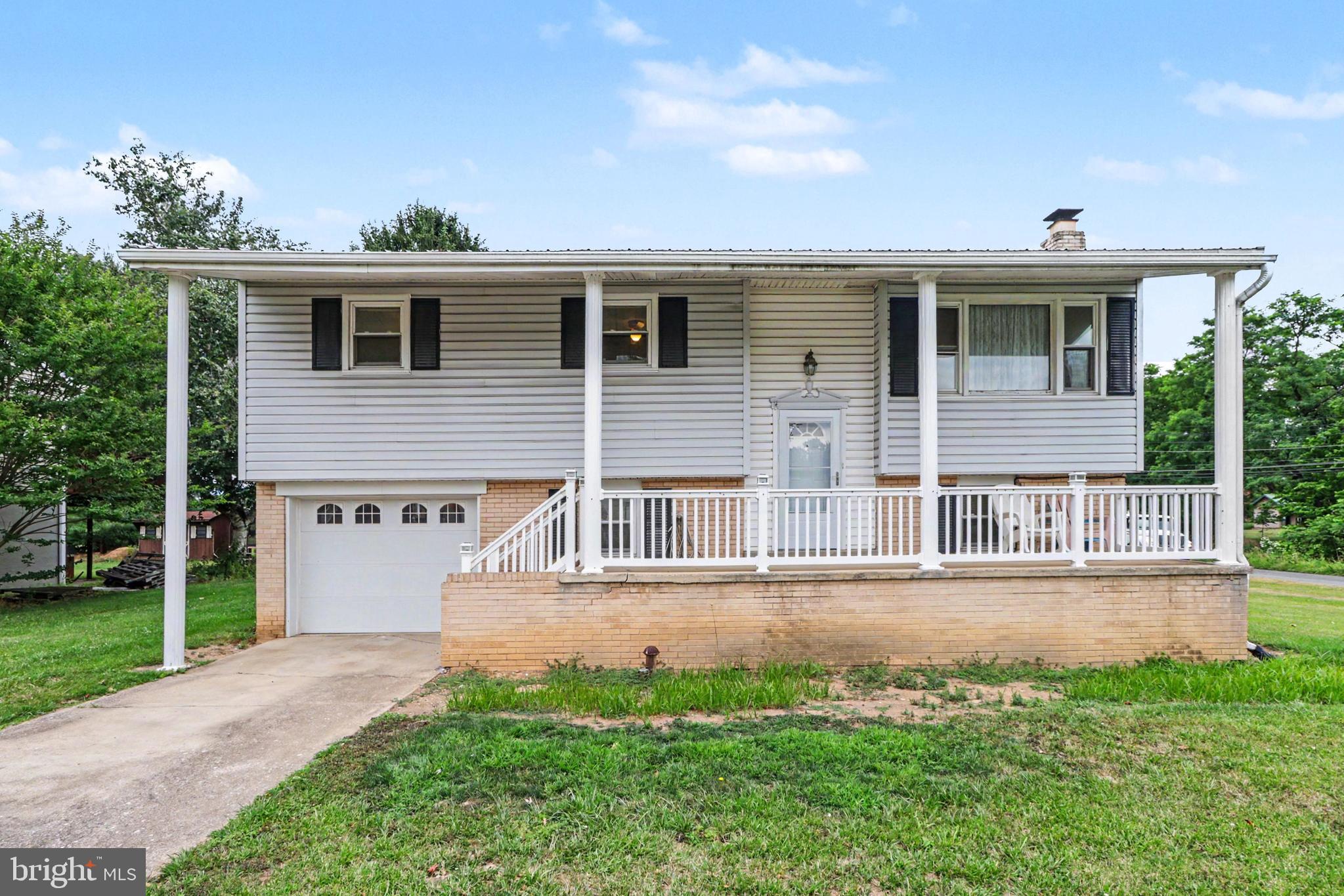 Welcome home to this bi-level situated on a desirable corner lot in the Mechanicsburg School District! This 3-bedroom, 1 full bath, and 2 half bath home offers a functional layout with plenty of space to spread out. Enjoy outdoor living on the large deck, perfect for entertaining or relaxing. Conveniently located near shopping, dining, and major routes, this property offers a great opportunity to make it your own and is being sold as-is.