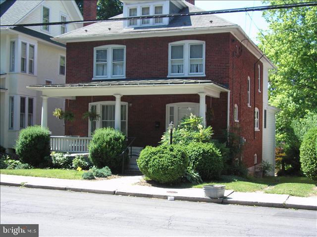 Downtown Winchester, circa 1926 foursquare. Kitchen addition, 3 bedrooms and two full baths. Walk Up attic, full basement , great yard.