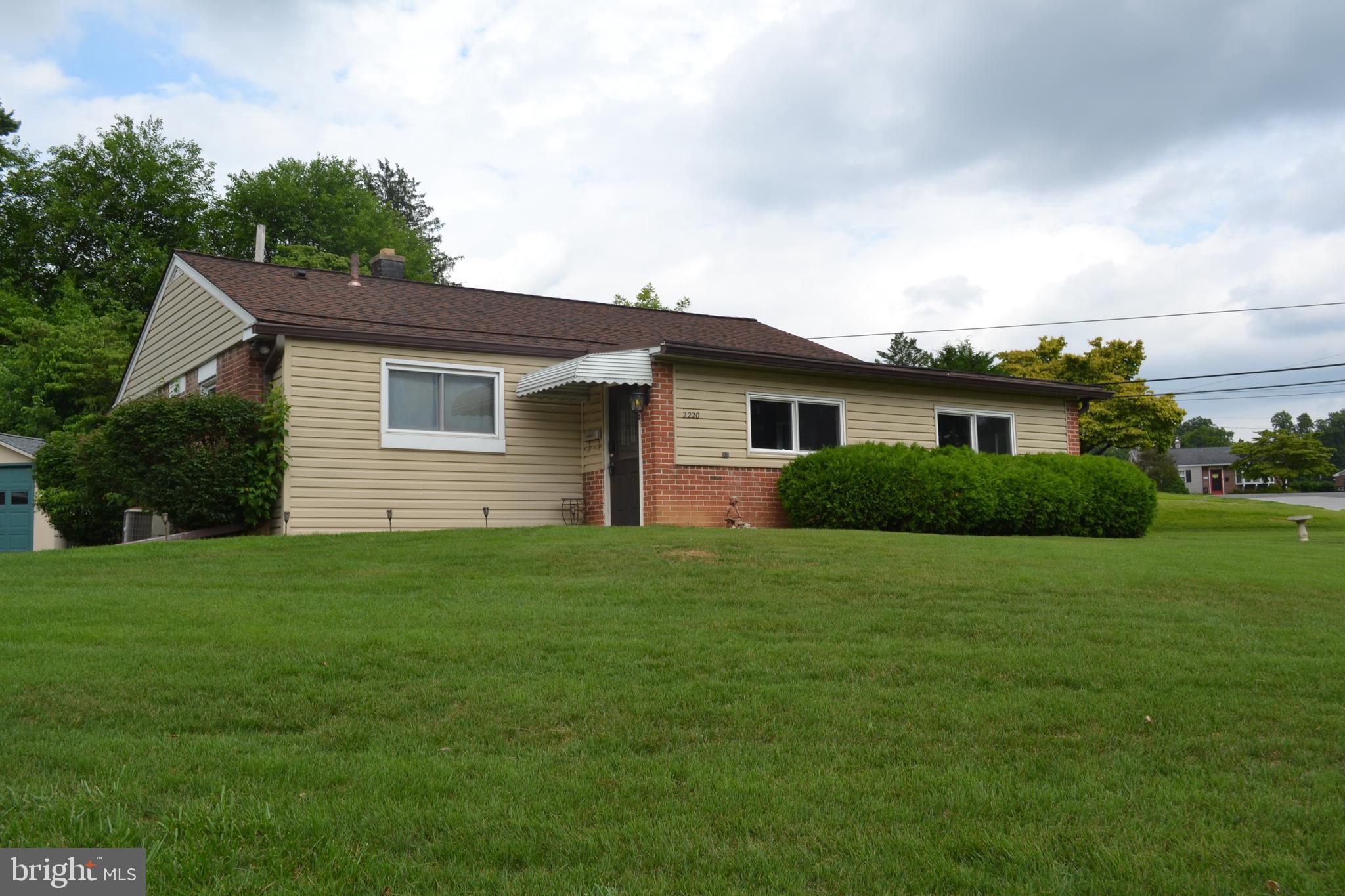 Lovely home in Bridgewater community on a large corner lot.  This home  is well built with brick and new vinyl siding.  The added wrap around addition/porch  allows for addition living space.  This is a 3 bedroom home with a new bathroom,  nice size eat-in-kitchen, hardwood floors throughout.  Nice size living room and and professionally fully finished basement.  Other features included a newer roof, vinyl windows throughout, hardwood floors, new hotwater heater,  newer Central air condiitoning,  newer oil tank.  It offers an awesome double wide drive long driveway for plenty of parking.  New shed in back yard.   Owner need to up-size so come and check this well built home out.