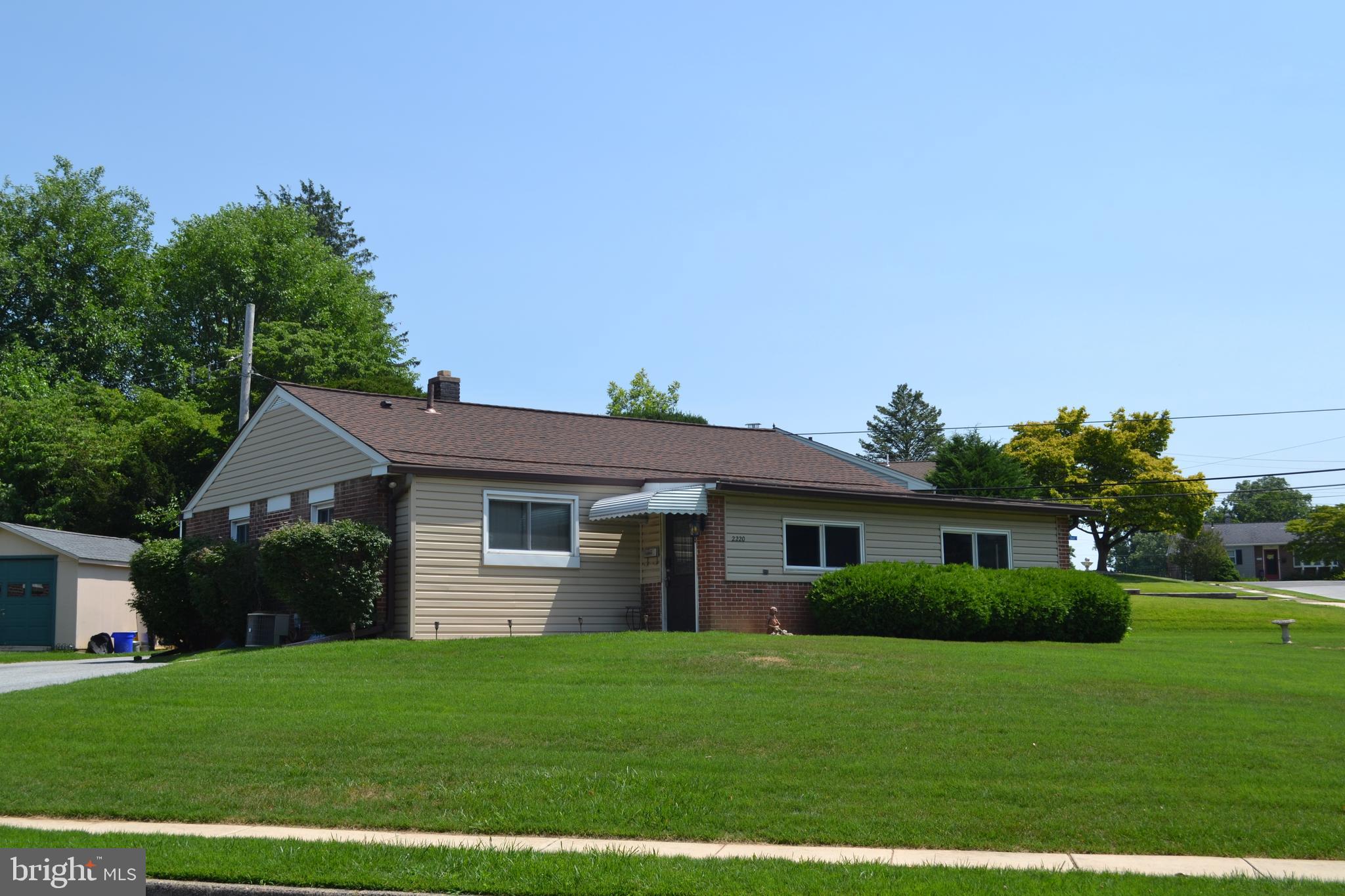 Lovely home in Bridgewater community on a large corner lot.  This home  is well built with brick and new vinyl siding.  The added wrap around addition/porch  allows for addition living space.  This is a 3 bedroom home with a new bathroom,  nice size eat-in-kitchen, hardwood floors throughout.  Nice size living room and and professionally fully finished basement.  Other features included a newer roof, vinyl windows throughout, hardwood floors, new hotwater heater,  newer Central air condiitoning,  newer oil tank.  It offers an awesome double wide drive long driveway for plenty of parking.  New shed in back yard.   Owner need to up-size so come and check this well built home out.