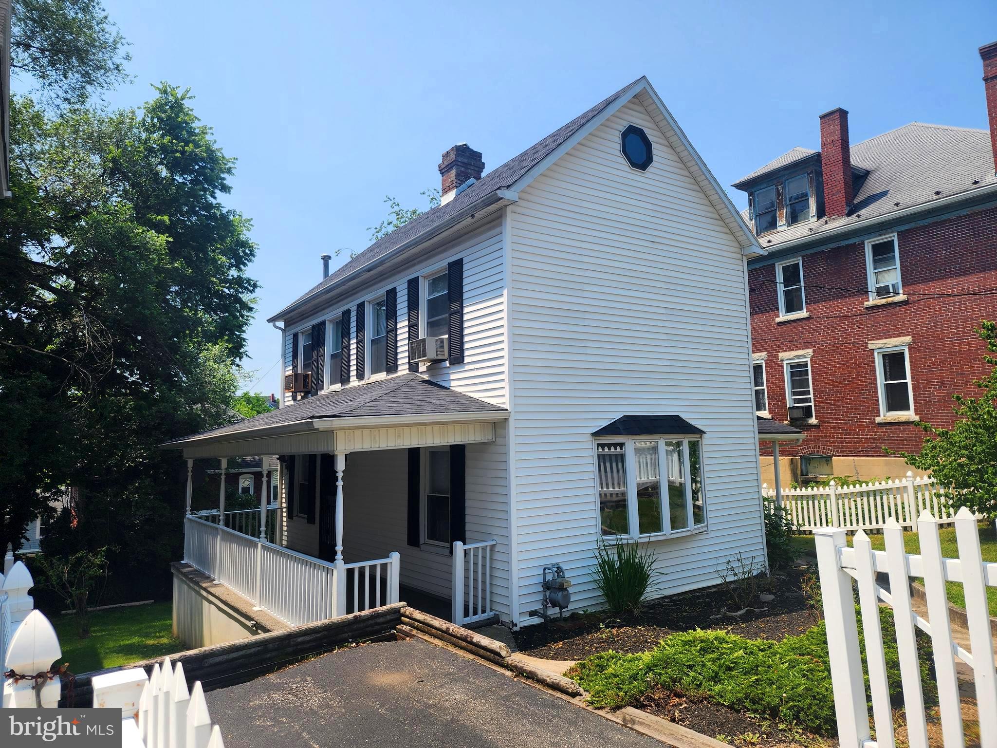 Charming, centrally air conditioned historic home in the Heart of Cumberland, MD Full of history and nestled in the beautiful mountains of Western Maryland, this comfortable home offers the perfect blend of old-world character, unique and modern updates. Built in 1860 and located in a picturesque historic neighborhood, you're just a short walk from the vibrant town center of Historic Cumberland, the scenic Great Allegheny Passage biking trail, and convenient access to I-68.  Located in the WESTSIDE neighborhood of Cumberland,  includes 2 bedrooms with area for easy adjutment to make 3 bedroom, 2 full bath (one on each floor), appliances included, replacement windows,  new roof in 2019, main level laundry, main level bedroom ensuite added in 2000, Located in a walkable, historic neighborhood, don’t miss out on this versatile and charming homew and one of Maryland’s hidden gems!