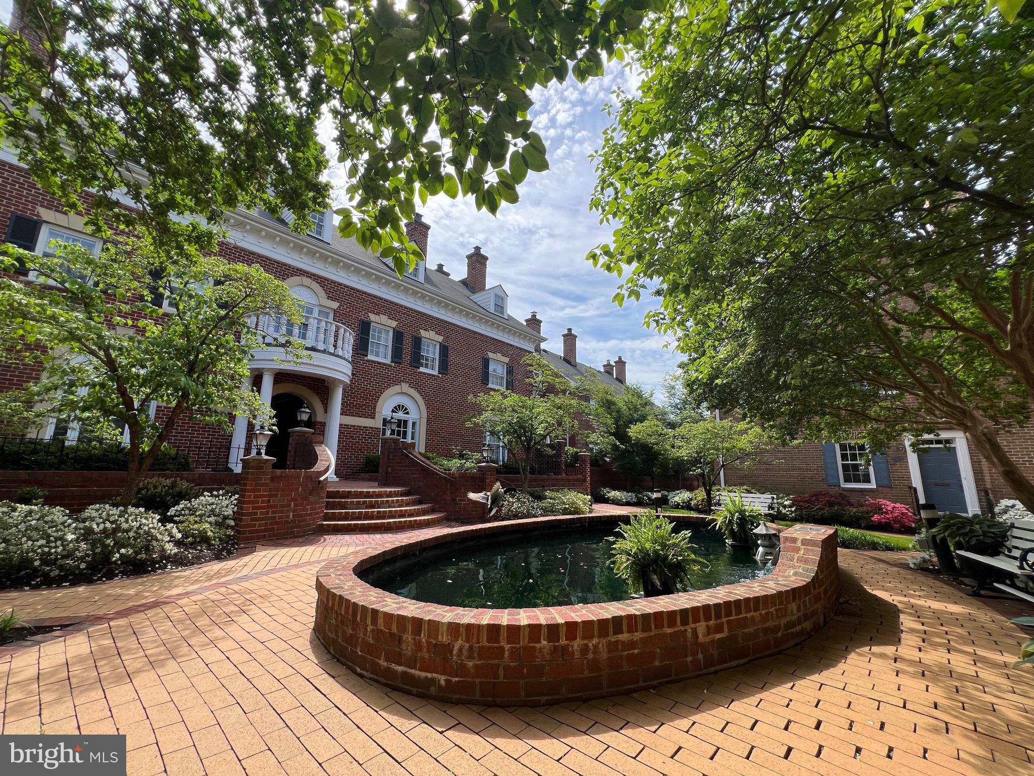 OPEN HOUSE: Monday, May 5 from 5:30-7:00PM!

**Charming Townhome in the Heart of Historic Old Town Alexandria**

Discover the perfect blend of historic charm and comfort in this beautiful two-bedroom, two-bathroom townhome located at 1024 North Royal Street. Situated in the vibrant Old Town North neighborhood, this residence offers  unparalleled access to urban amenities.

PROPERTY FEATURES
- Freshly painted interiors complemented by gleaming hardwood floors and recessed lighting throughout
- Spacious living and dining areas with custom built-ins, ideal for entertaining
- Designer kitchen featuring stainless steel appliances, a kitchen island, white granite countertops, and Shaker-style cabinetry
- Two full bathrooms with contemporary finishes
- Private brick-enclosed patio garden accessible through elegant French doors
- In-unit washer and dryer for added convenience
- One assigned parking space 

TRANSPORTATION
- Metro Access:  Approximately 0.7 miles (15-minute walk) to Braddock Road Metro Station, serving the Blue and Yellow Lines
- Amtrak & VRE: About 1.2 miles (5-minute drive) to Alexandria Union Station, offering Amtrak and Virginia Railway Express services
- Bus Services: Nearby access to Metrobus Route 10B, providing connections between Hunting Point and Ballston-MU Station
- Airport: Roughly 3.5 miles (10-minute drive) to Ronald Reagan Washington National Airport 

ABOUT THE NEIGHBORHOOD
Enjoy proximity to an array of restaurants, boutique shops, parks, playgrounds, and scenic trails. The Potomac River waterfront is just a short stroll away, offering picturesque views and recreational opportunities. Additionally, the King Street Trolley provides free, convenient access to the heart of Old Town Alexandria. 

This exceptional townhome offers a unique opportunity to experience the best of Old Town living with modern conveniences and excellent connectivity.