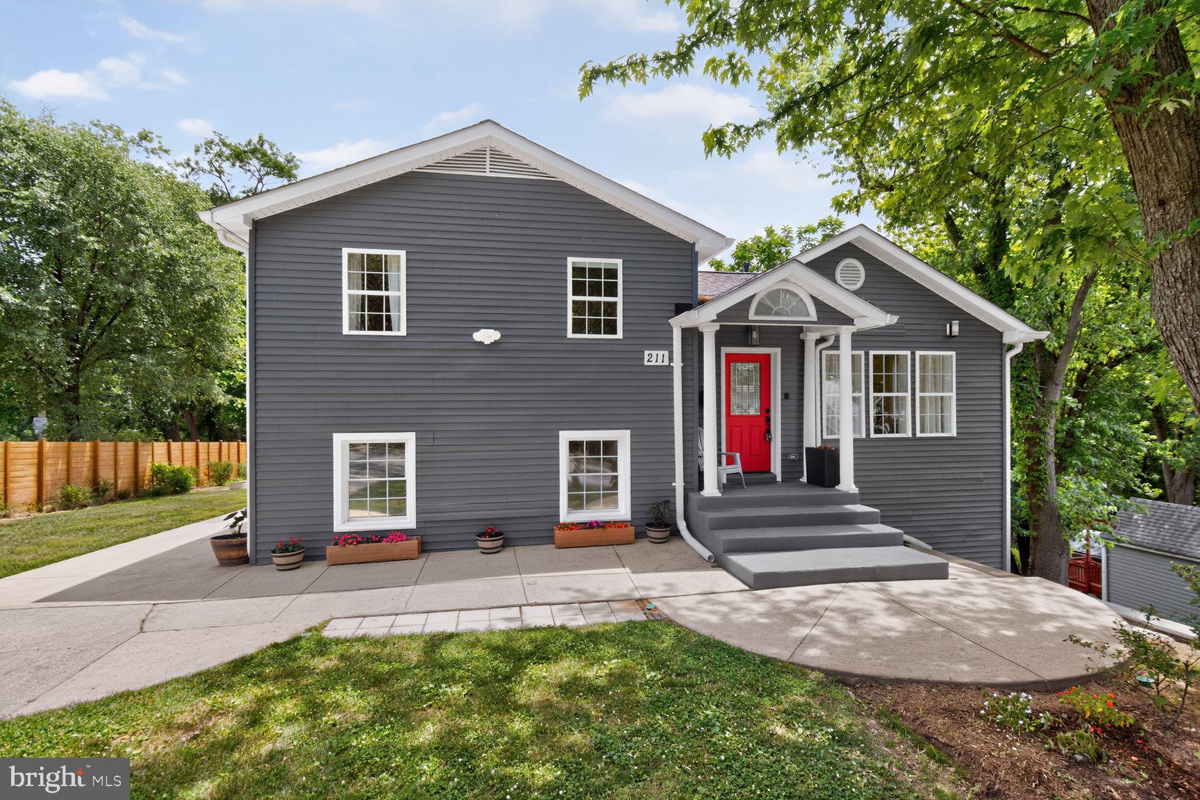Welcome to this recently renovated,  stylishly updated spacious house in an AMAZING location!  This 4-level house offers up to 5 bedrooms and 3.5 bathrooms and is situated on lot just under 1/3 of an acre. 

The entrance features a section of elegant inlaid wood in the main level's beautiful hardwood floor. The open-concept floor plan is perfect for everyday living and entertaining, with a large living/family room that seamlessly flows into the contemporary kitchen which features stainless steel appliances, a pantry, kitchen island with cabinets on 3 sides and a breakfast bar. The gas stove features a middle griddle section.  The marble countertops and flooring maintain the light and bright feel of the main level, augmented by 2 skylights (installed in 2023 when the roof was replaced) and 3 walls of windows in the dining area, which also provides access to stairs down to the back yard. The main level includes a 1/2 bath.  

The upper level features wood floors and includes 3 BRs, one with an en-suite bathroom with a spa-like shower panel in the tub/shower combo. ** Lower level 1 was used as the Primary suite; you'll walk down into the sitting room/office with access to the back yard, the Primary bedroom, and another spa inspired bathroom.  **The fully finished lower level 2 includes a large recreation area with door out to the side of the house, a small bedroom, with it's own door to the rear of the house and yet another elegantly finished full bathroom.  This level also includes the washer and dryer. **Both lower levels feature brand new carpeting.

Throughout the house you'll find  recessed lighting fixtures, fresh paint and elegant Roman shades that open from the top or the bottom with a light canceling shade in Lower Level 2. 

Situated on a desirable corner lot at the top of a cul-de-sac with 4 houses, this home boasts a huge backyard.  Ample parking provides convenience for both family and guests.  A privacy fence runs along the side street with path access to Maryvale Park, which boosts a soccer field, basketball courts, large children's playground and a covered pavilion off a water jet play area.

Ideally located less than a mile from the Rockville Metro and MARC Station and downtown Rockville and in close proximity to the shopping centers, parks, dining, entertainment and amenities along Rockville Pike, this exceptional home combines modern updates, generous living space, and an unbeatable location. Come make 211 Charles St your new home!