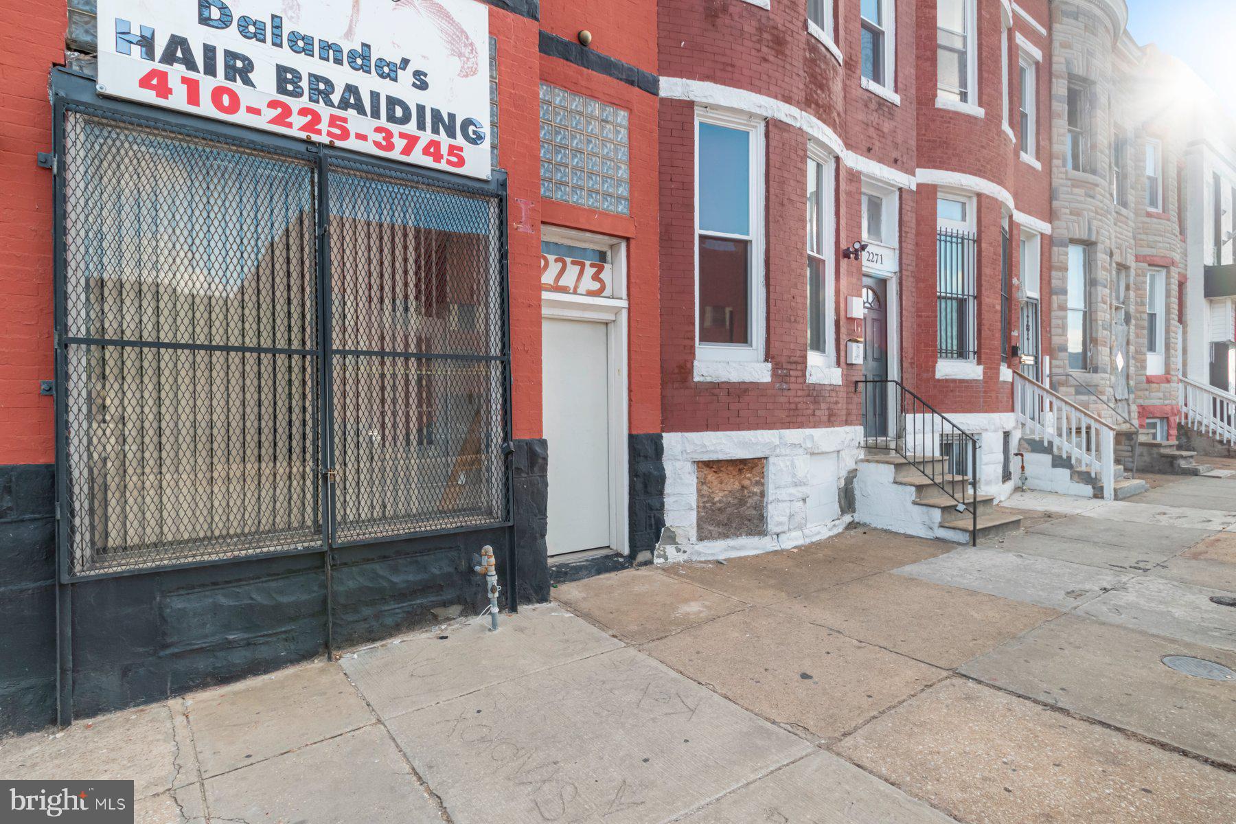 *MIXED USE PROPERTY* Spacious storefront with 2br / 1ba apartment upstairs. Storefront was previously a hair salon. Unit includes a half bathroom, basement/backyard access, and ample storage towards the back. Apartment is vacant . Newer appliances, fresh paint, and newer windows. Hot water heaters are 5 years young. Newer fence in the backyard. Minutes from Baltimore Zoo, Mondawmin, and I- 83. Sold As is
