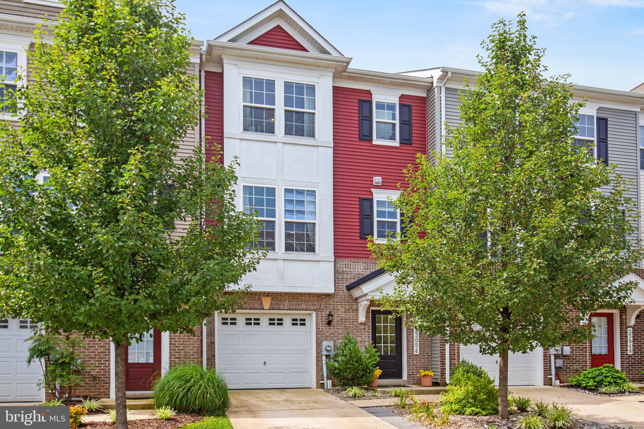Welcome to this beautifully maintained 2018 townhome in the highly sought-after Wildewood community, offering a rare combination of modern updates, low-maintenance living, and one of the most desirable settings in the neighborhood. This home features zero carpet throughout, with hardwood and luxury vinyl plank flooring. Additionally, the entire interior has been freshly repainted from the original builder-grade finish using high-quality, durable, washable paint. The cabinetry and interior finishes throughout the home are light, airy, and modern and include upgraded white subway tile backsplash, along with a desirable gas stove for enhanced cooking performance. The thoughtfully designed layout also includes two spacious primary bedrooms, each with its own private en-suite bath, offering flexibility and comfort for a variety of living arrangements.

Thoughtfully designed landscaping sets this property apart from the moment you arrive. The front yard has been professionally transformed by Wentworth Nursery with elegant river rock landscaping, creating exceptional curb appeal with minimal upkeep. Out back, you’ll find a brand-new privacy fence installed by Thomas Fence (July 2026) and a professionally designed stone patio by Wentworth Nursery.

One of the home’s most exceptional features is its private, wooded backdrop. Instead of neighboring homes, you’ll enjoy peaceful views of mature treetops year-round as the property backs to Evergreen Elementary School and the community’s connected walking paths, creating an open, green setting that’s rarely available in townhome living.

As part of the Wildewood community, residents enjoy HOA amenities including the community swimming pool, playgrounds, parks, basketball and tennis/pickleball courts, miles of sidewalks and walking trails, and beautifully maintained green spaces. Conveniently located just minutes from NAS Patuxent River, shopping, dining, grocery stores, entertainment, and the waterfront attractions of Solomons Island.