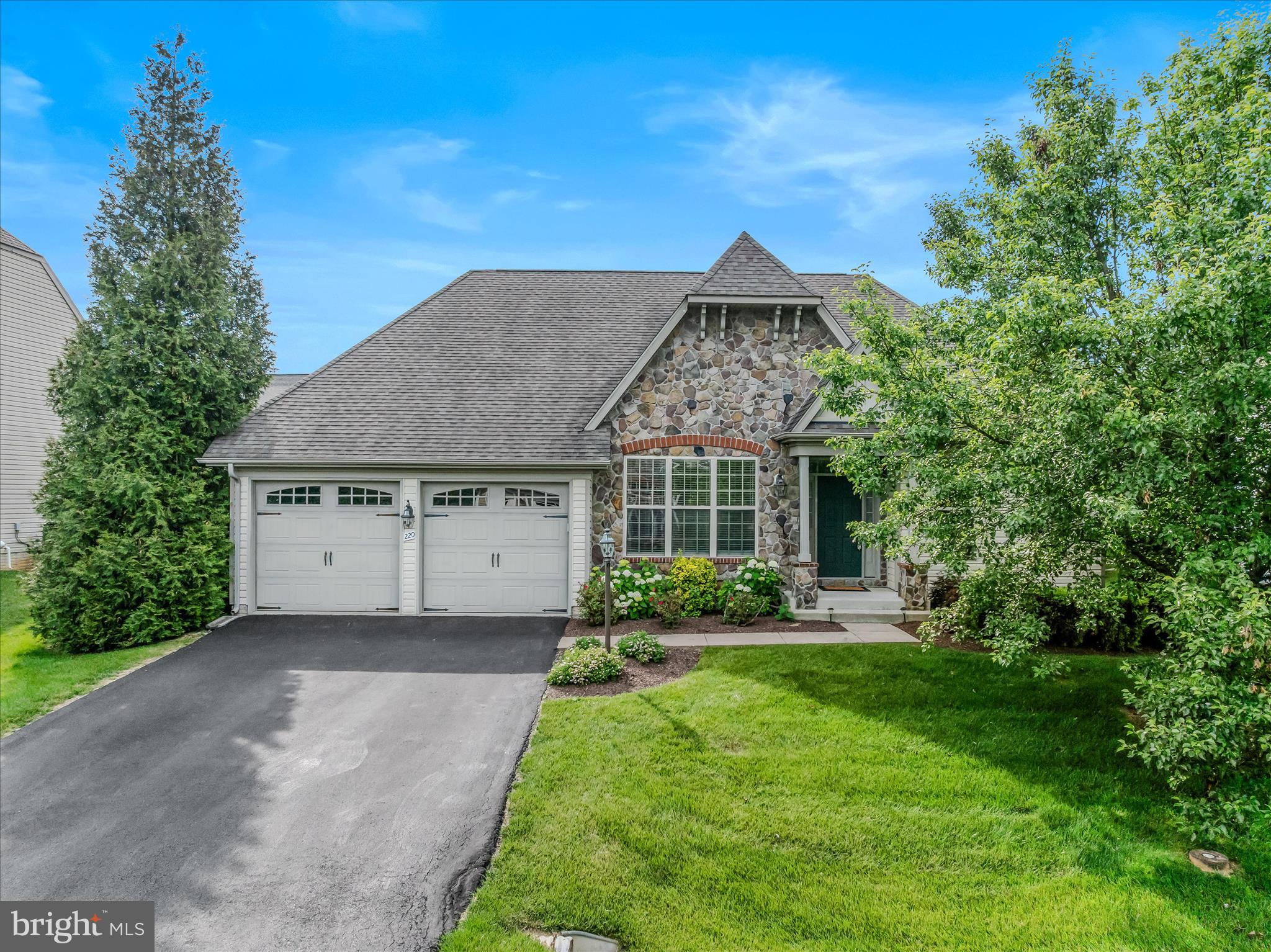 Absolutely stunning rancher located in the highly sought-after Beallair subdivision, offering over 3,000 finished square feet of beautifully updated living space. This move-in-ready home features fresh paint, brand-new carpeting, and refinished hardwood floors throughout.

The spacious main-level primary suite boasts a luxurious en-suite bath complete with a double vanity and walk-in shower. The gourmet kitchen is a true showpiece, featuring granite countertops, stainless steel appliances, a gas cooktop, pot filler, double ovens, and high-end custom cabinetry. The open-concept kitchen and living area is highlighted by a cozy fireplace and provides the perfect setting for entertaining family and friends.

Step outside to enjoy the screened-in porch overlooking the fully fenced backyard, creating a private outdoor retreat. The fully finished basement offers exceptional additional living space, including a second fireplace, custom bar area with two beverage refrigerators, a dedicated movie theater room, a fourth bedroom, and a full bath.

As if the home itself wasn’t enough, the Beallair community offers outstanding amenities including a community pool, walking trails, and front and rear lawn landscaping services, allowing for a low-maintenance lifestyle. This exceptional property truly has it all—luxury, comfort, convenience, and community.