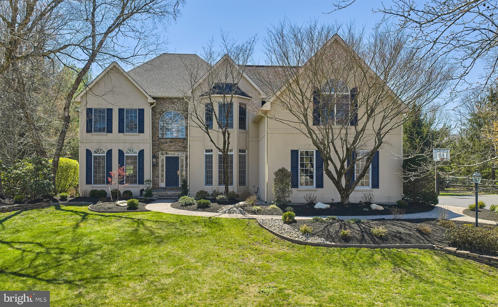 Set on .92 acres in the established Deerfield neighborhood off Windy Bush, this 3,964 sq ft residence offers 4 bedrooms, 4.5 baths, a finished basement, and a pool with spa and extensive mature landscaping. 

A spacious entry opens to a private study on the right, with formal living and dining rooms positioned to the left and extending toward the rear of the home. Extensive millwork, crown molding, and wainscoting define much of the first floor and continue through the staircase. The home opens up in the kitchen and great room, both offering views of the backyard and pool. The kitchen features generous workspace, abundant windows, and a large solarium-style breakfast room, flowing into a vaulted great room with a gas fireplace and secondary staircase to the upper level. A wet bar with additional storage is positioned just off the kitchen and great room. A main-level laundry room, powder room, and access to the three-car garage add everyday functionality.

Upstairs, the primary suite includes a beautifully updated bath (2018), dual walk-in closets, and a bonus retreat just beyond the bath—ideal for a sitting area, office, or gym. Three additional bedrooms complete the second level, including one en suite and two bedrooms with walk-in closets connected by a Jack-and-Jill bath with separate vanities and a shared tub, shower, and toilet room.

The finished lower level offers a large open area for multiple uses, an additional room suited for office, gym, or play, and a full bathroom.

Outdoors, the property features extensive hardscaping, a large paver patio, built-in grill and refrigerator, pool, and spa, all surrounded by mature landscaping.

Recent improvements include a new roof (2023), HVAC (2023), and carpeting (2024). A well-maintained home with neutral finishes throughout, offering a solid foundation for future customization.