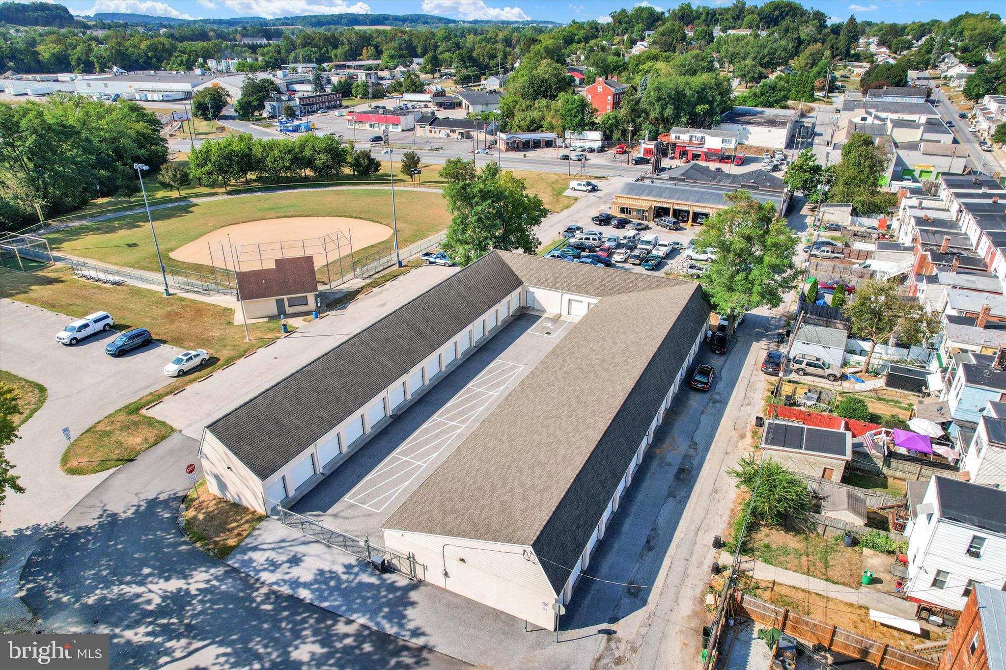 Priced BELOW Market Valuation - Turn-key 46-unit Mini Storage Facility offering a secure, well-maintained investment opportunity in a highly accessible location. Situated on a corner parcel with convenient ingress and egress, the property is located just off Richland Avenue near BAE Systems, in York's west end, minutes from York College and the future York Creek Redevelopment Project.  Constructed of durable block materials for long-term, low-maintenance ownership, this meticulously maintained facility presents an exceptional opportunity for immediate income generation. The property features a variety of unit sizes to accommodate a broad tenant base. Units 1-31 are located within a security-gated area, providing enhanced protection and tenant confidence. Unit 31 is currently configured as an on-site office, offering flexibility for owner-operator management or administrative use. Units 32-46 are positioned along the exterior of the building, allowing for convenient drive-up access. All units are equipped with overhead garage-style doors and heavy-duty locking systems designed for ease of use and security.  The property is extremely clean, well-organized, and operates efficiently — ideal for investors seeking a low-hassle, income-producing asset. Opportunities to acquire a storage facility of this caliber are hard to find.  There is NO Sign on the property.  AGENTS - Please read Agent Remarks and review Bright Documents for additional information.