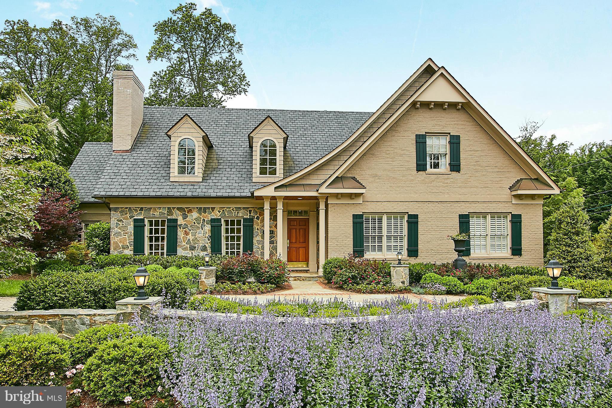 Innovatively designed, energy efficient impressive Stone/Brick Cape Cod custom built by J L Albrittain is the perfect fit if you are seeking one-level living yet want separate spaces for family & guests. Skylighted ceilings impeccable detailing QUALITY wine cellar 3 car side load garage private patio landscape lighting Truly stunning! Easy to own in the best neighborhood in town!