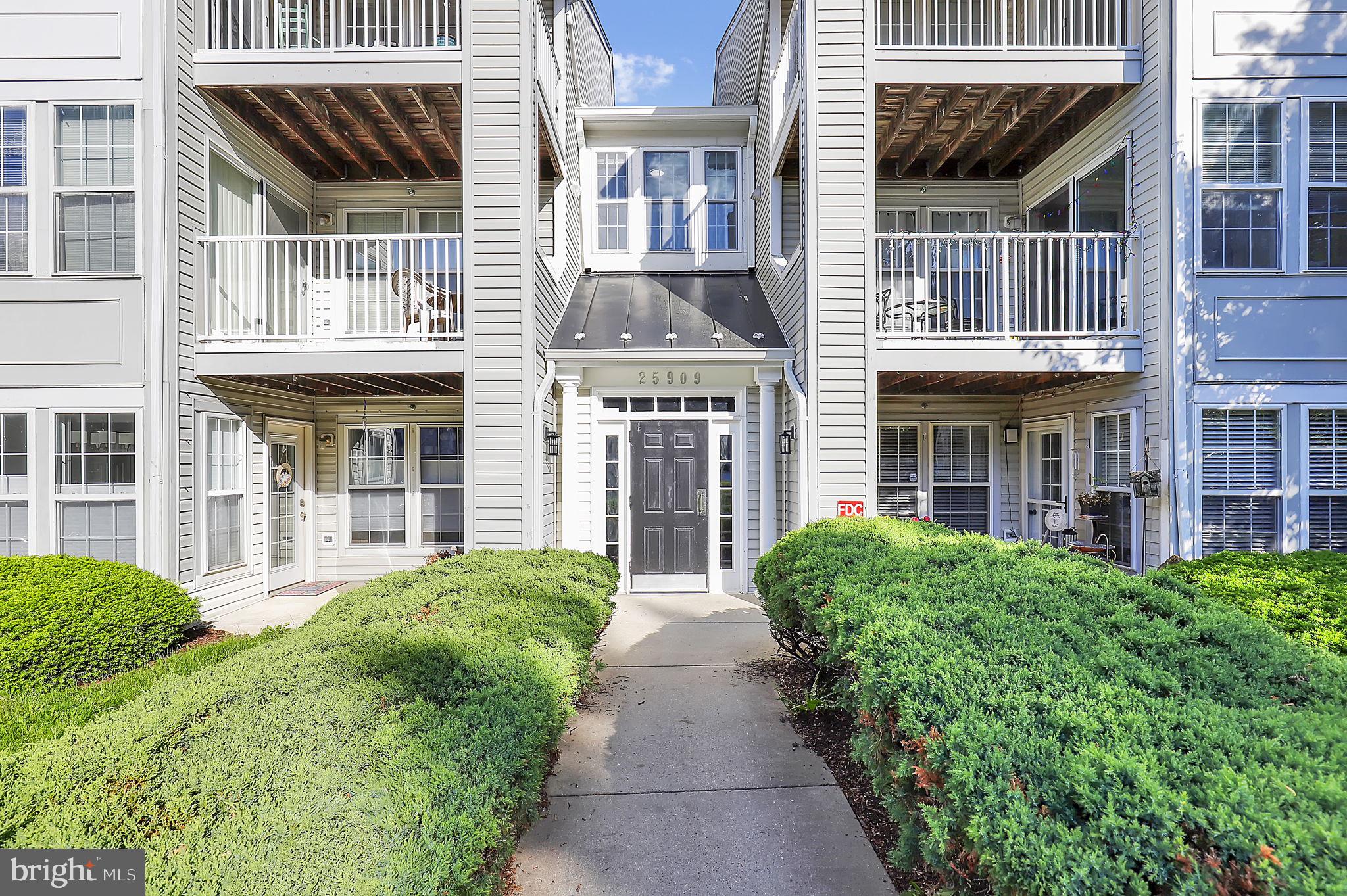 Welcome to this beautifully maintained top-floor condo in the desirable Damascus community of Ridge Manor. Located at 25909 Ridge Manor Dr #J, this inviting 2-bedroom, 2-bathroom home offers a bright and airy layout with soaring vaulted ceilings that create an open, spacious feel throughout the main living area.
Natural light pours in, highlighting the comfortable living and dining spaces—perfect for relaxing or entertaining. The well-appointed kitchen flows seamlessly into the main area, making everyday living both functional and enjoyable.
The primary suite features a private ensuite bathroom and a generous walk-in closet, providing the ideal retreat at the end of the day. A second bedroom and full hall bath offer flexibility for guests, a home office, or additional living space.
Conveniently located near a variety of shopping and dining options, and with easy access to major commuter routes, this home offers both comfort and accessibility. Whether you're a first-time buyer, downsizing, or seeking a low-maintenance lifestyle, this top-floor unit is a fantastic opportunity to call Damascus home.  Mortgage savings may be available for buyers of this listing.